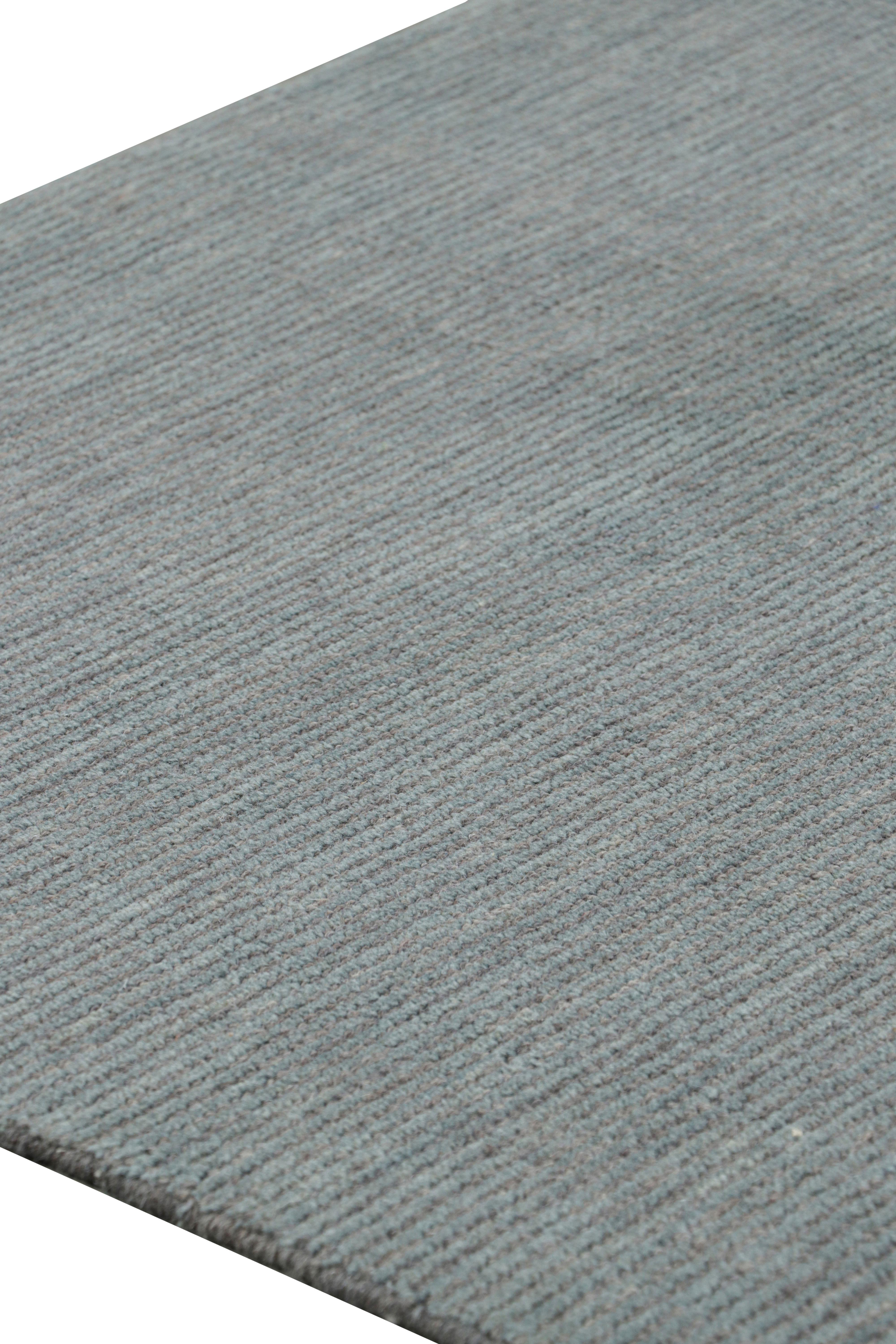 Anudada a mano en lana, esta alfombra de 8x10 es una nueva y atrevida incorporación a la Colección Textural de Rug & Kilim, con un impresionante uso de una paleta humilde en su juego único de rayas, estrías y la sutileza de las alfombras