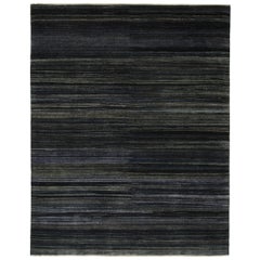Rug & Kilim: Tappeto moderno a righe e strisce grigie, blu e nere.