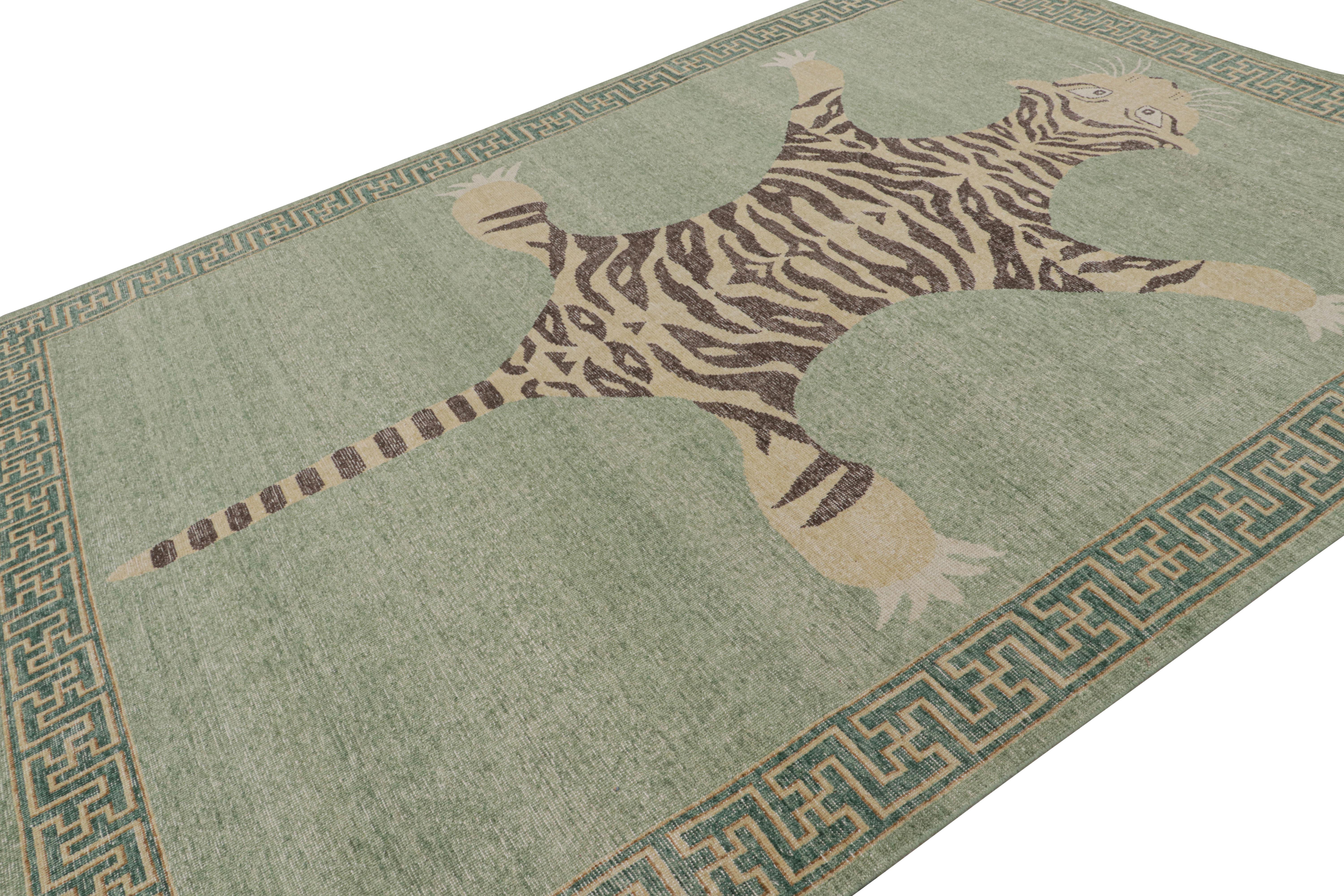 Hand-knotted in wool, this 9x12 modern tiger pictorial rug is from Rug & Kilim’s Homage collection. 

On the Design: 

Keen eyes will enjoy beige-brown tiger representation on a spacious green field. A regal piece with a majestic, dramatic
