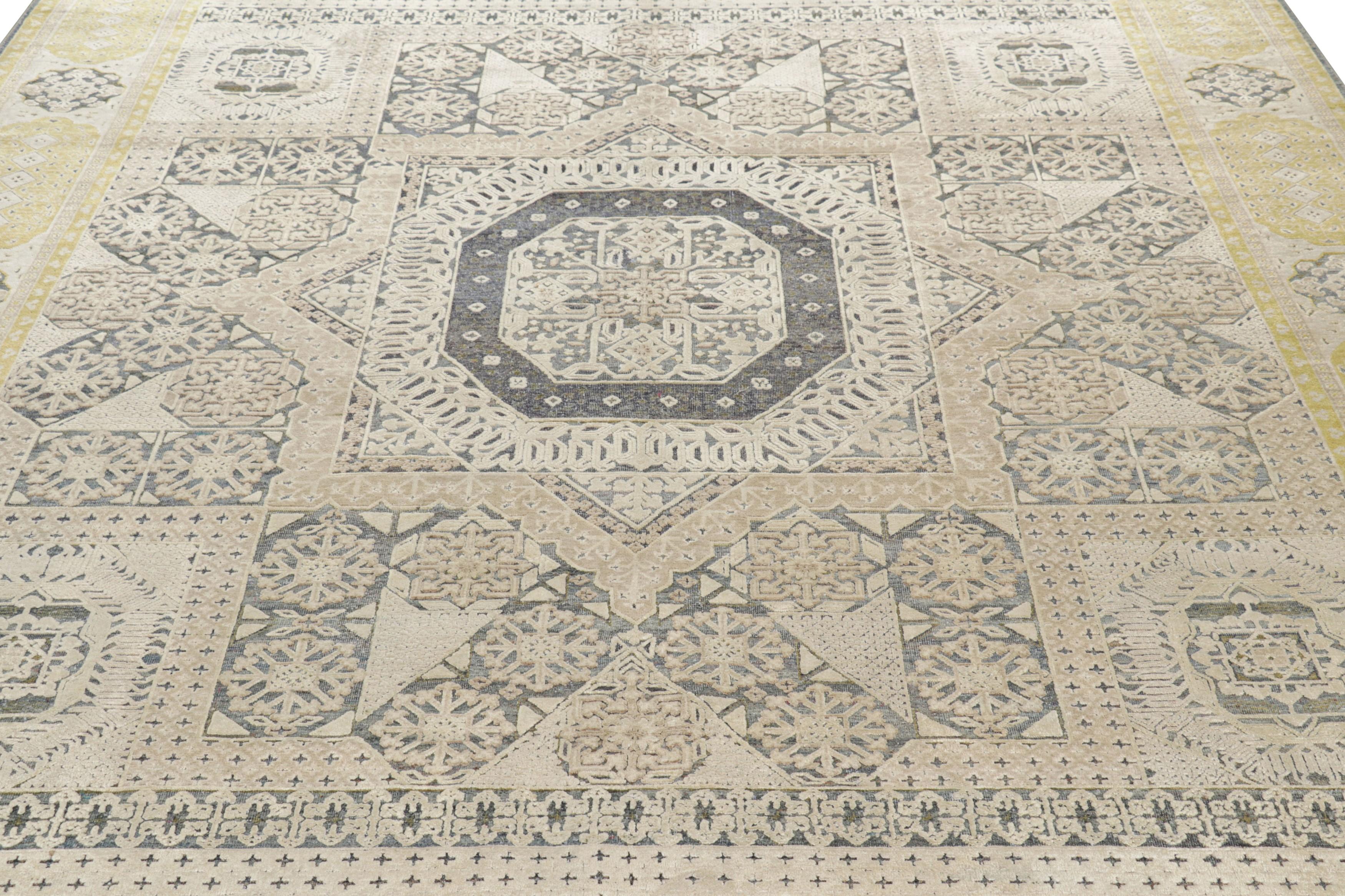 Hand-knotted in a luxurious blend of wool and silk, this 8x10 rug is a bold reimagining of Mogul rugs in Rug & Kilim’s most elegant Modern Classics Collection.

On the Design: 

A gold border enfolds beige and gray field tones, which underscore
