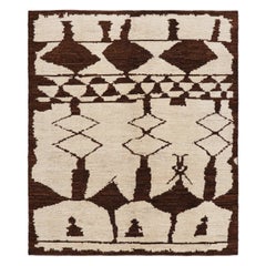 Rug & Kilim è un tappeto in stile Mogul con motivi floreali e medaglioni color verde acqua e rosso.