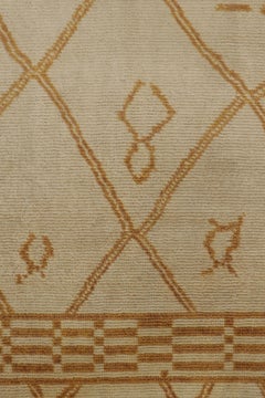 Rug & Kilim’s Moroccan-Inspired Rug, Beige with Primitivist Geometry in Rust