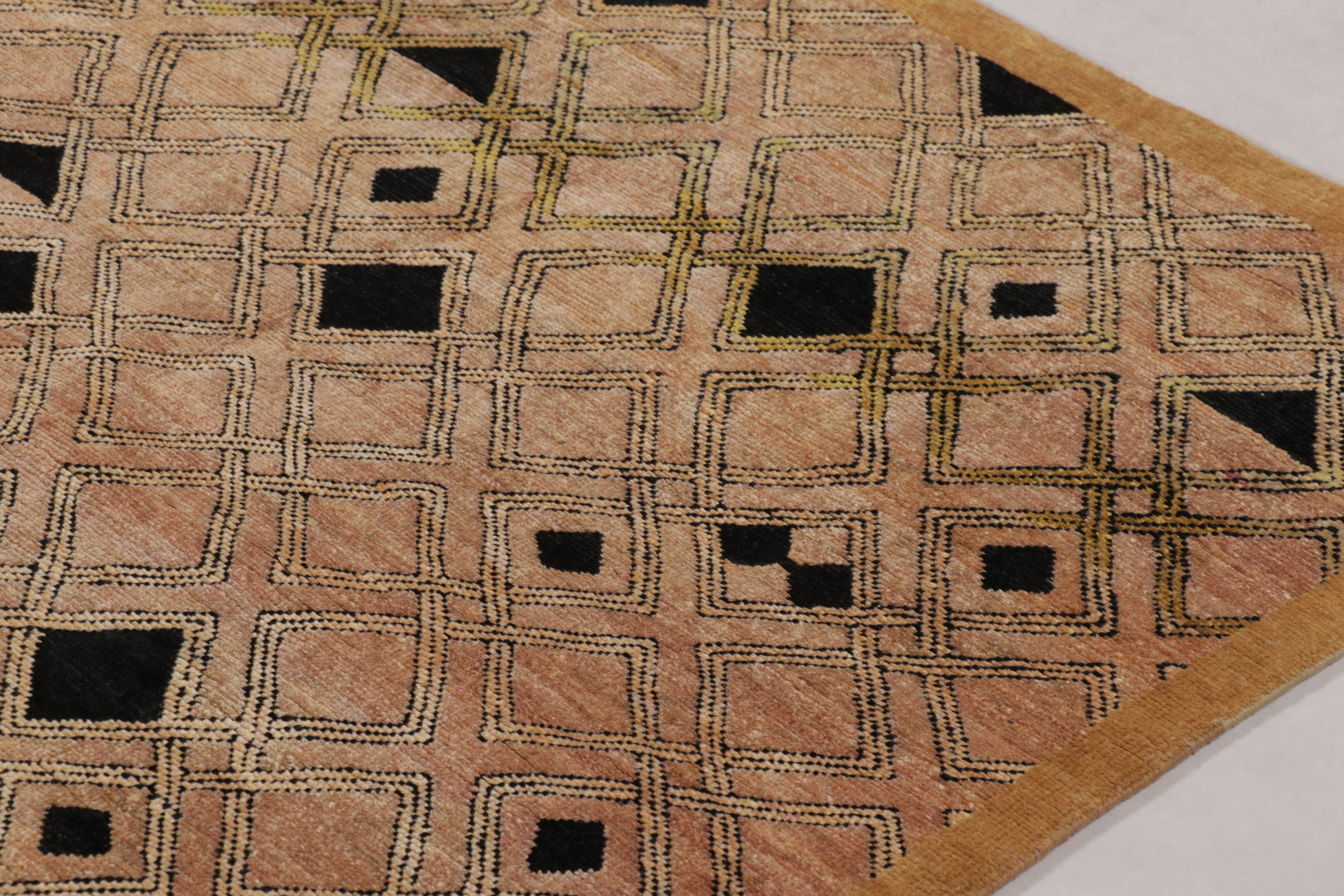 This 8x9 rug from Rug & Kilim’s Modern Classics Collection showcases deconstructed geometric artistry. It features an all-over diamond lattice pattern with intentionally fragmented motifs, where elements of solid black starkly contrast with a field