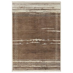 Rug & Kilim’s Moroccan-Inspired Rug, Rustic Brown and Cream Primitivist Patterns
