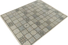Rug & Kilim’s Moroccan-Inspired Rug in White and Blue Tribal Medallions