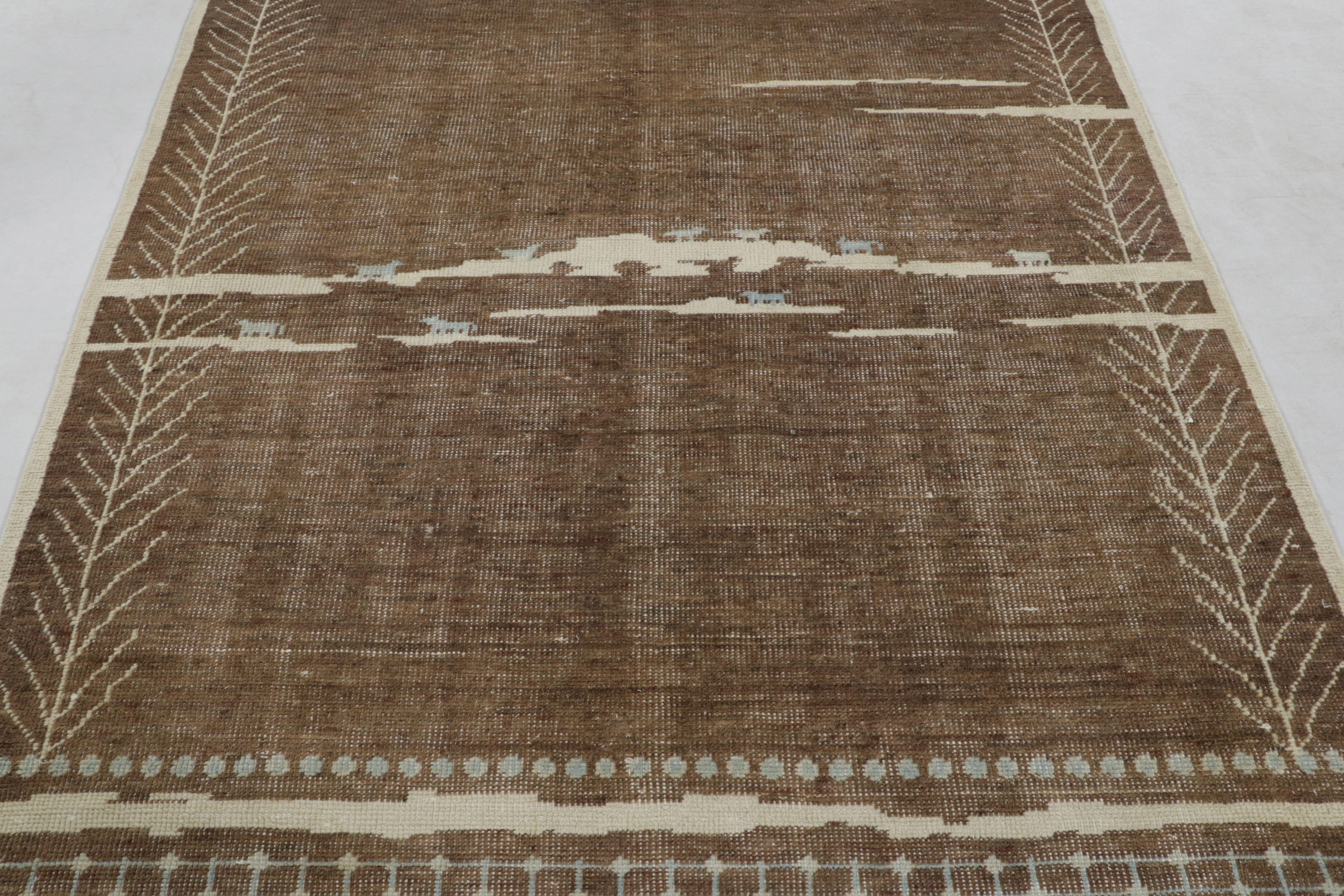 Indiano Rug & Kilim è un tappeto di ispirazione marocchina, con geometria primitivista marrone e crema. in vendita