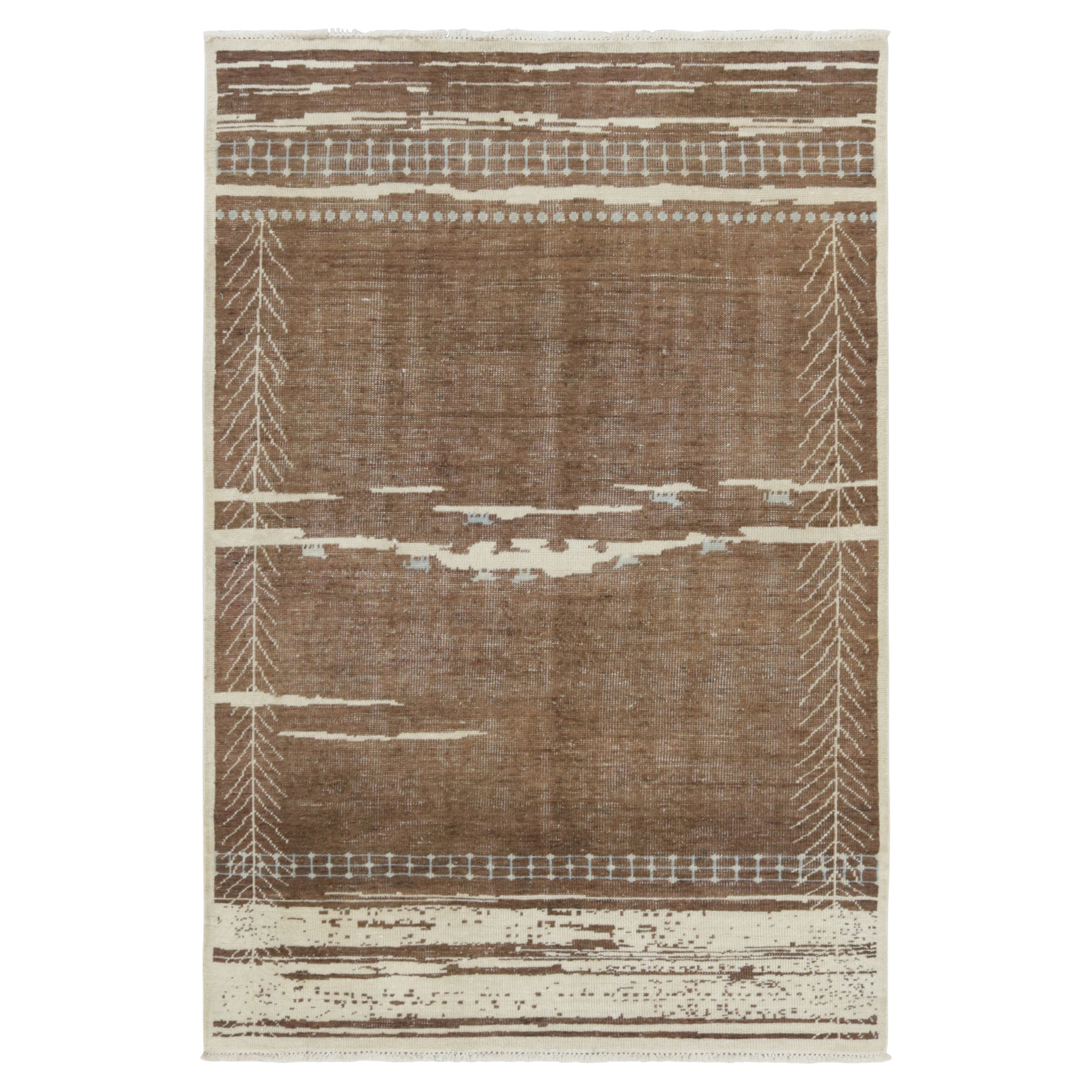 Rug & Kilim’s Moroccan-Inspired Rug, Rich Brown and Cream Primitivist Geometry