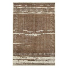 Rug & Kilim’s Moroccan-Inspired Rug, Rich Brown and Cream Primitivist Geometry