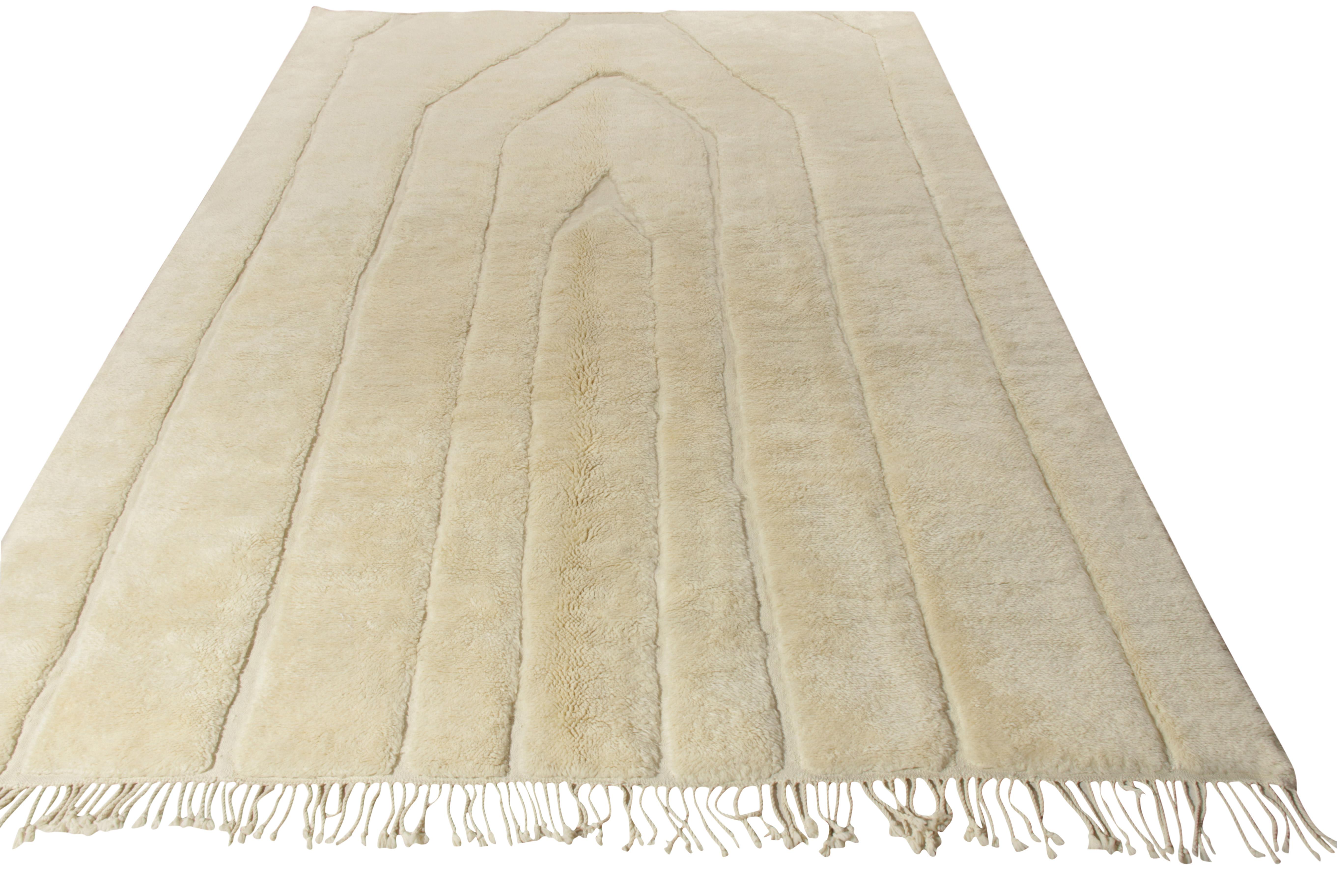 Hand knotted in premium quality yarn, this high-low contemporary selection from Rug & Kilim’s Moroccan Collection is an example of a minimalist vision wrapped in a unique textural sensibility. Subtle drawing on Berber tribal pieces in thought and