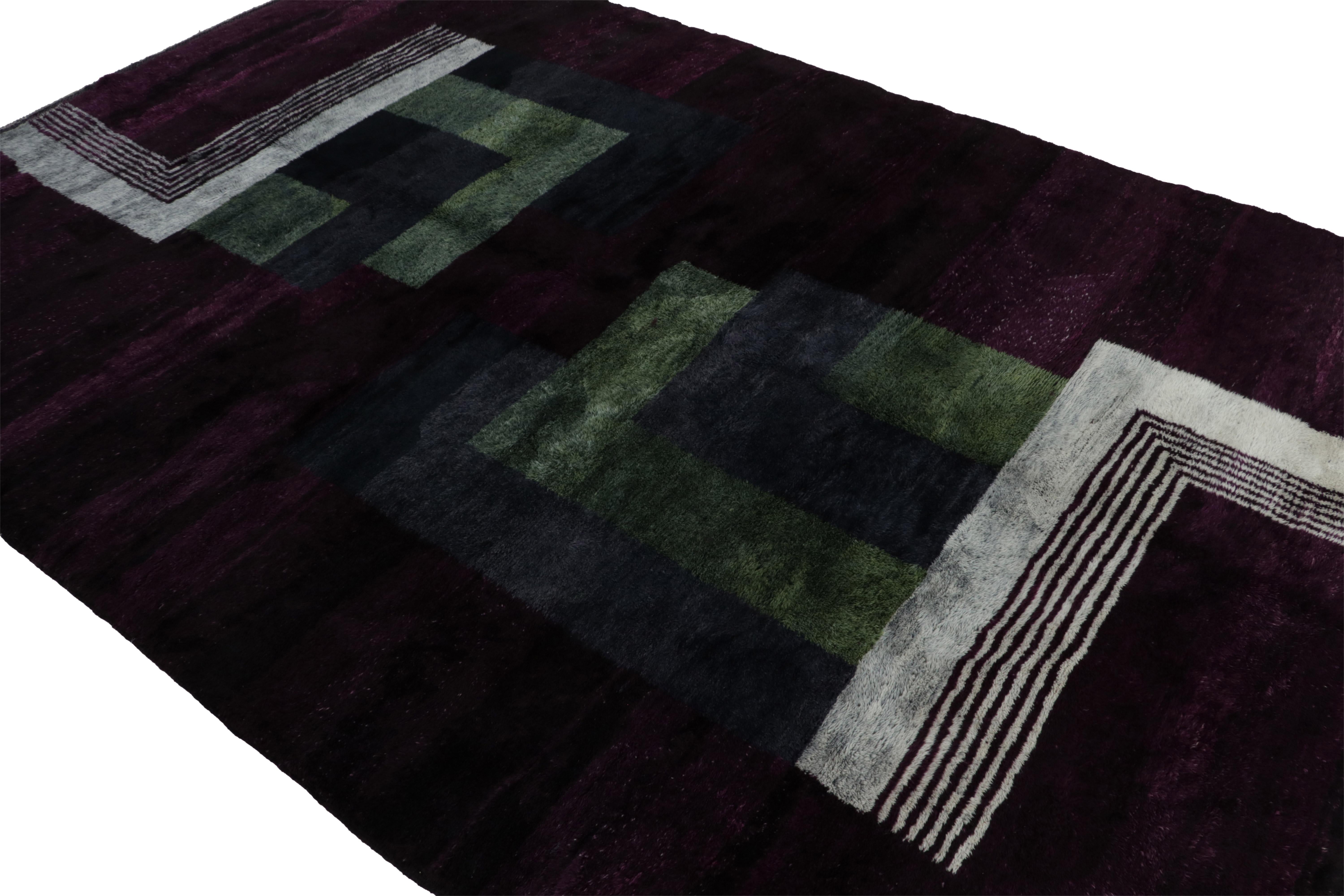 This hand-knotted wool 7x10 Moroccan rug by Rug & Kilim represents an exciting new line of modern tribal rugs. Its design plays Art Deco-style geometric patterns with the lush pile texture and primitivist feel of the Berber tradition.

On the