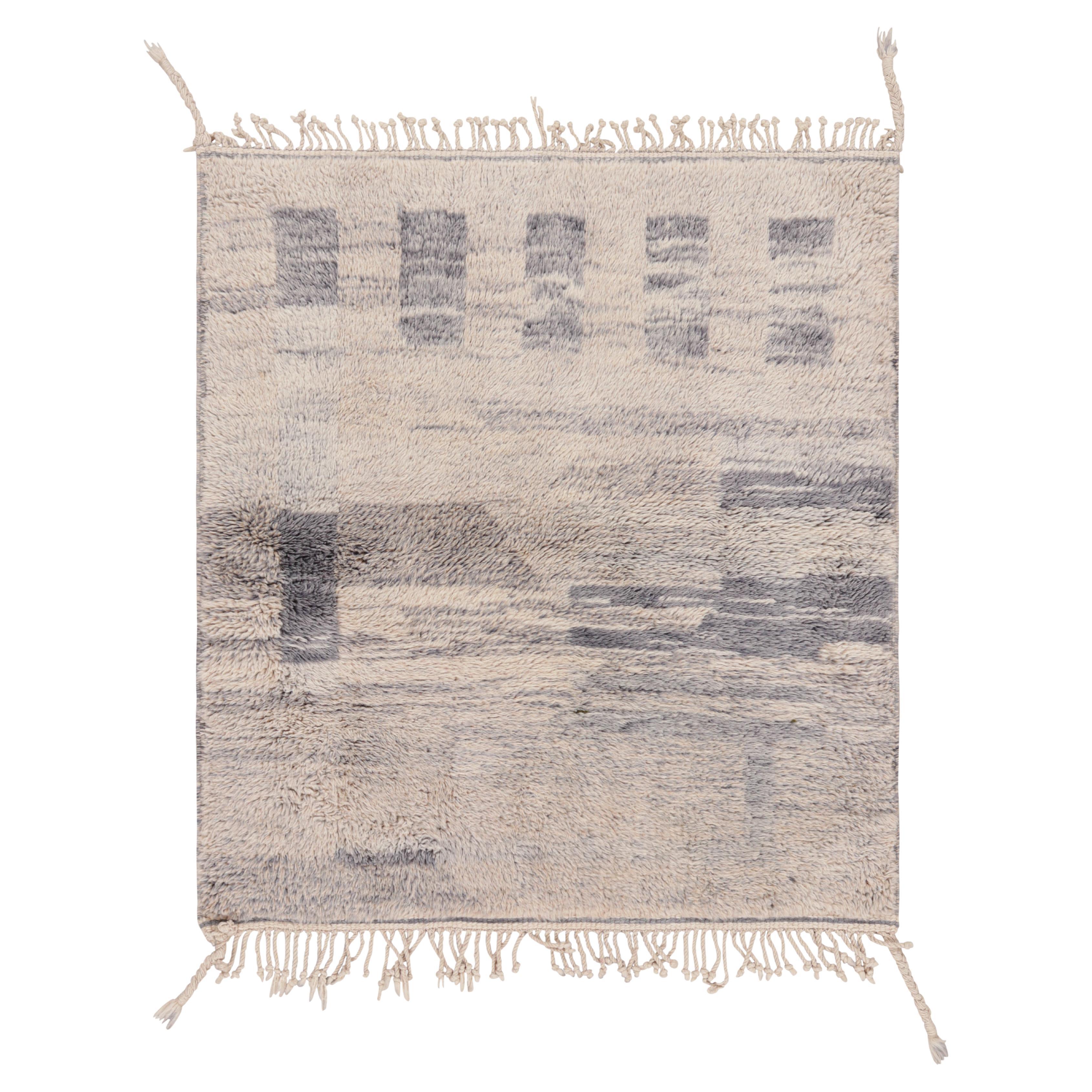 Rug & Kilim’s Moroccan Rug in White and Blue with Geometric Patterns