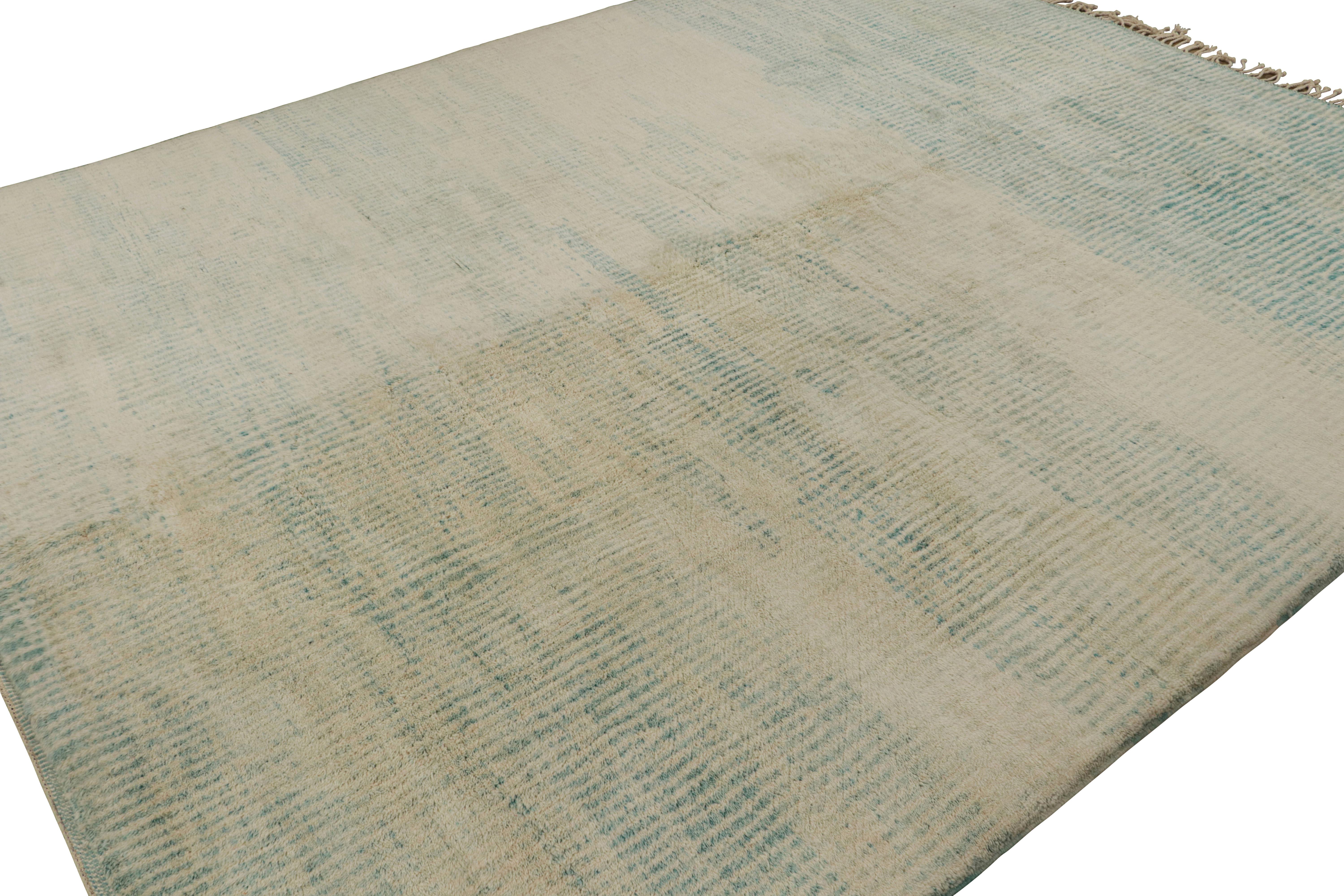 Hand-knotted in wool, this 11x13 Moroccan rug by Rug & Kilim represents a new line of contemporary tribal rugs. Its design represents some of the most devoted nomadic weavers in rural Morocco, both keeping a rich tradition alive and helping it to