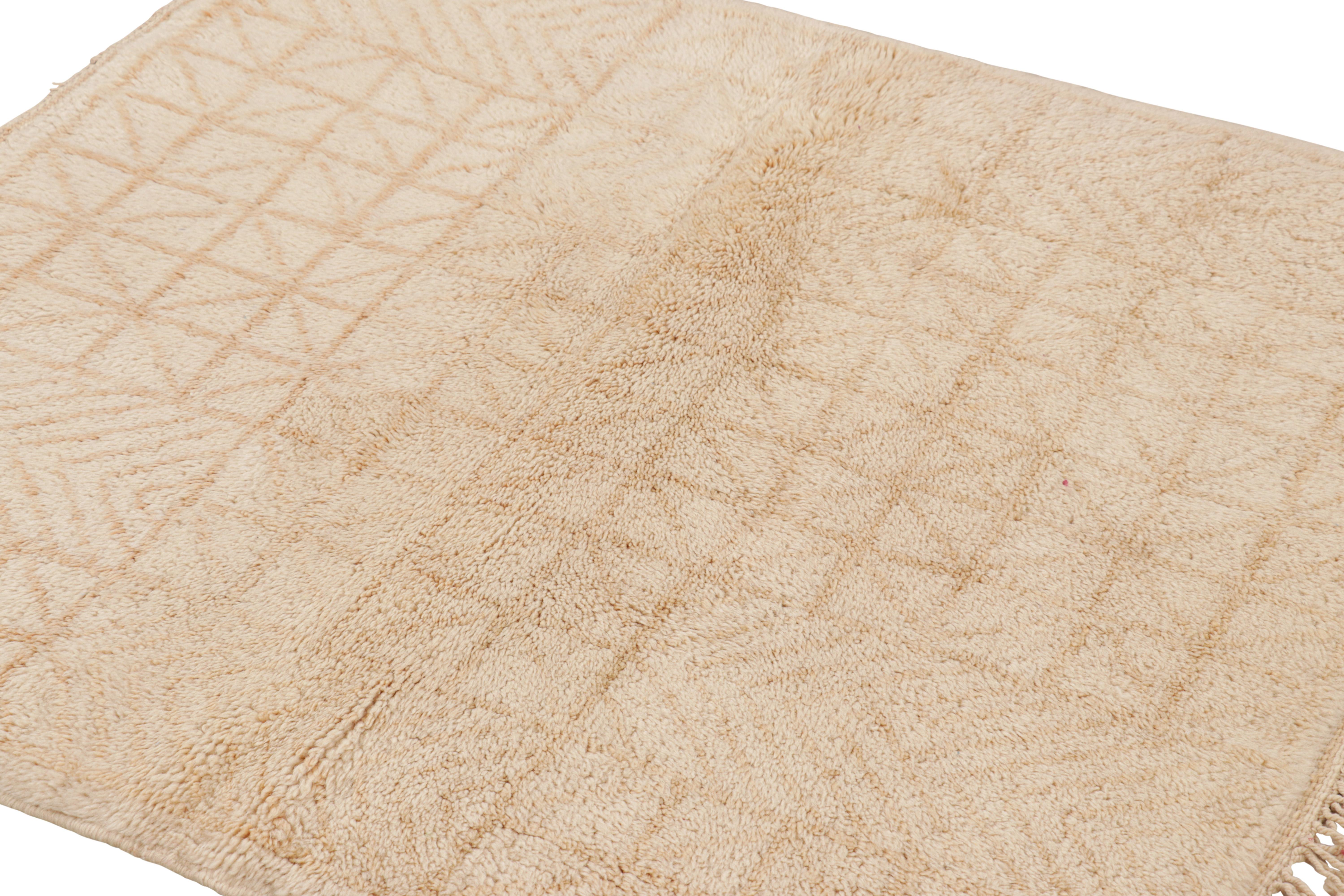 Hand-knotted in wool, this 4x4 Moroccan rug is an exciting new addition to our special collection made by contemporary tribal weavers from the rural communities of the middle atlas. 

On the Design: 

A play of beige-brown and cream white tones