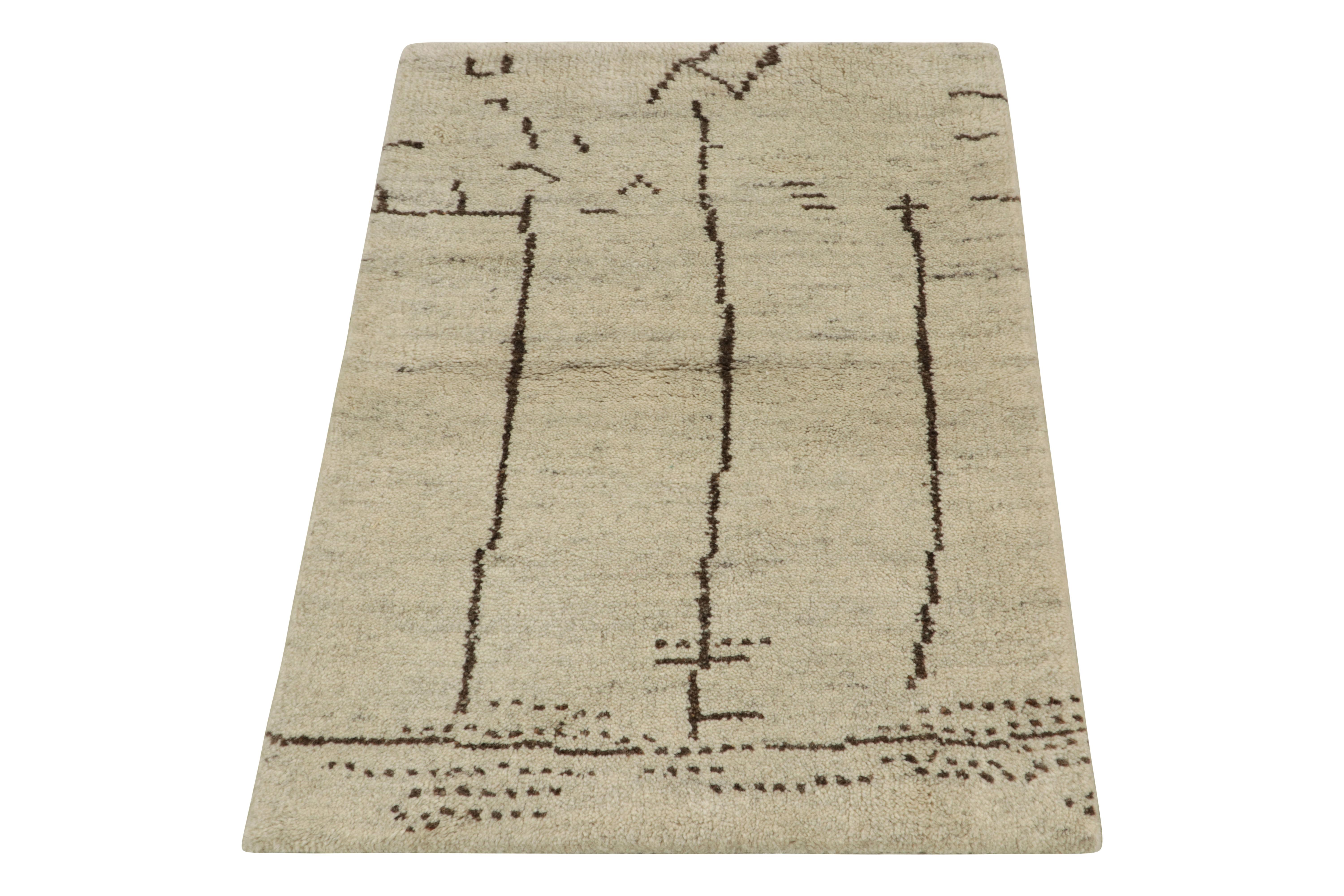 Hand-knotted in wool, a 2x3 rendering inspired by Moroccan style exemplifying Rug & Kilim’s take on contemporary aesthetics. The subtle appeal of the rug comes from a minimal geometric design playing comfortably with the negative space in a beige