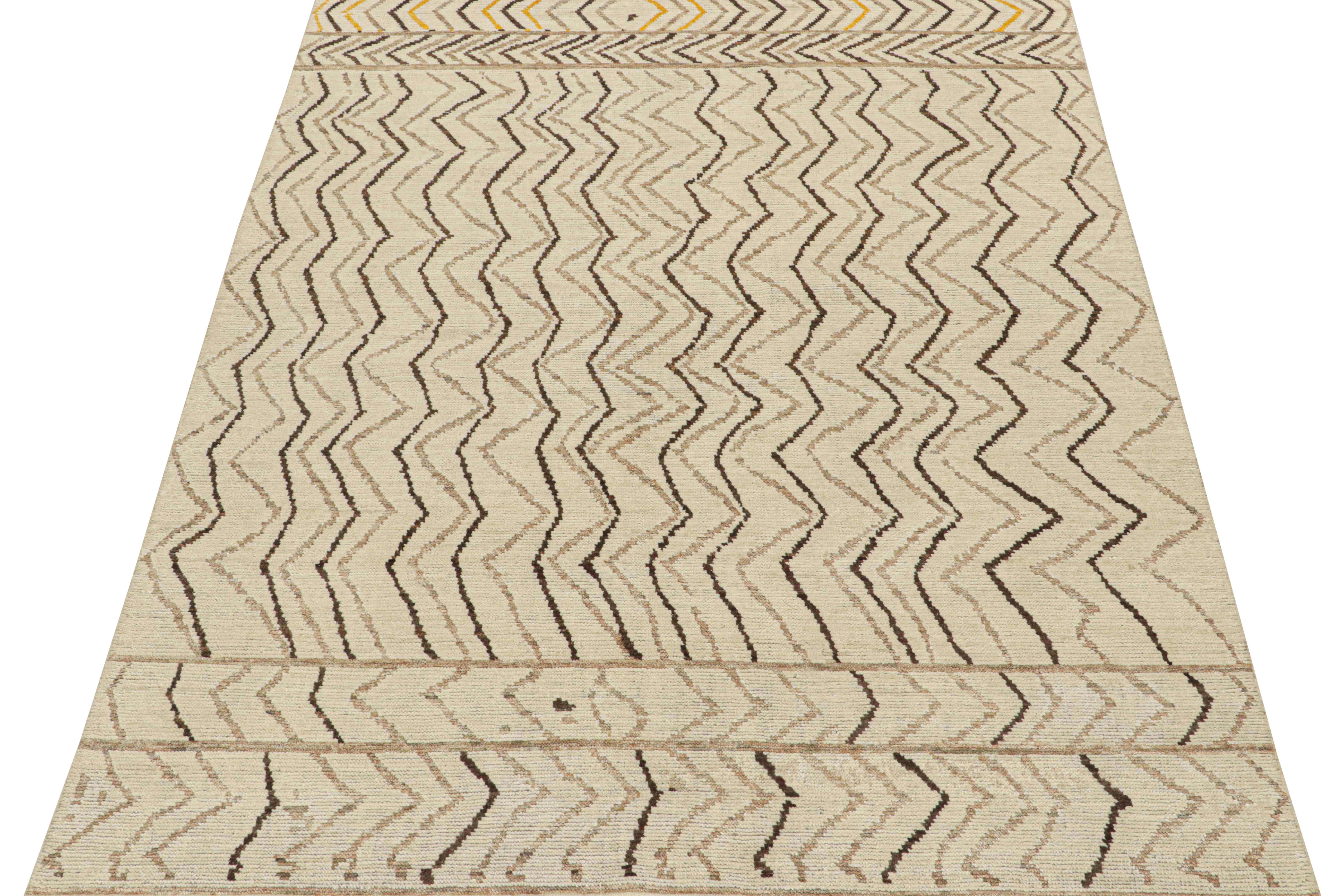 This 8x10 rug is a new addition to Rug & Kilim’s Moroccan rug collection. Hand-knotted in wool, its design recaptures the classic tribal sensibility in a new modern quality.

This particular design enjoys stripes and geometric patterns, and an