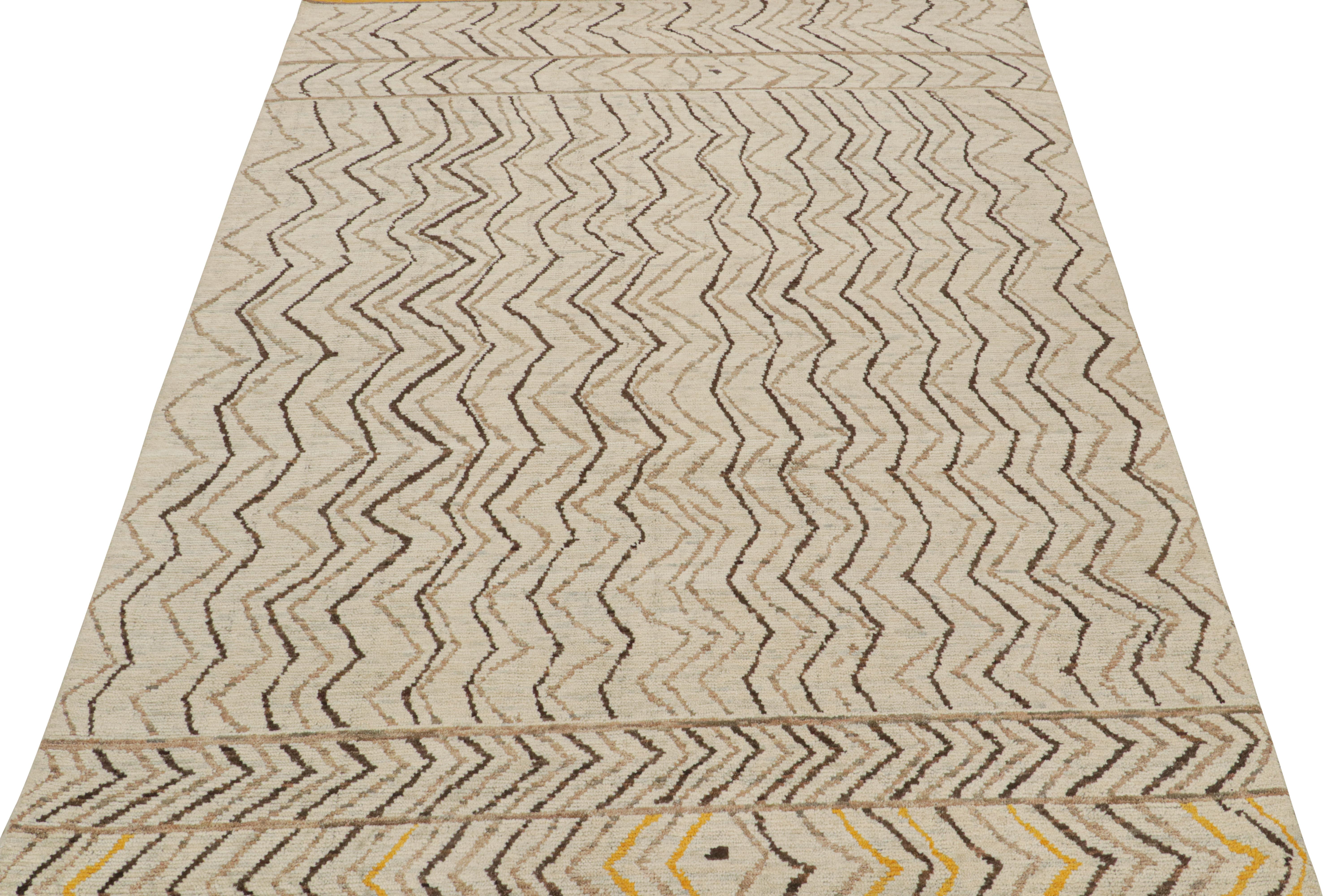 This 9x12 rug is a new addition to Rug & Kilim’s Moroccan rug collection. Hand-knotted in wool, its design recaptures the classic tribal sensibility in a new modern quality.

This particular design enjoys stripes and geometric patterns, and an