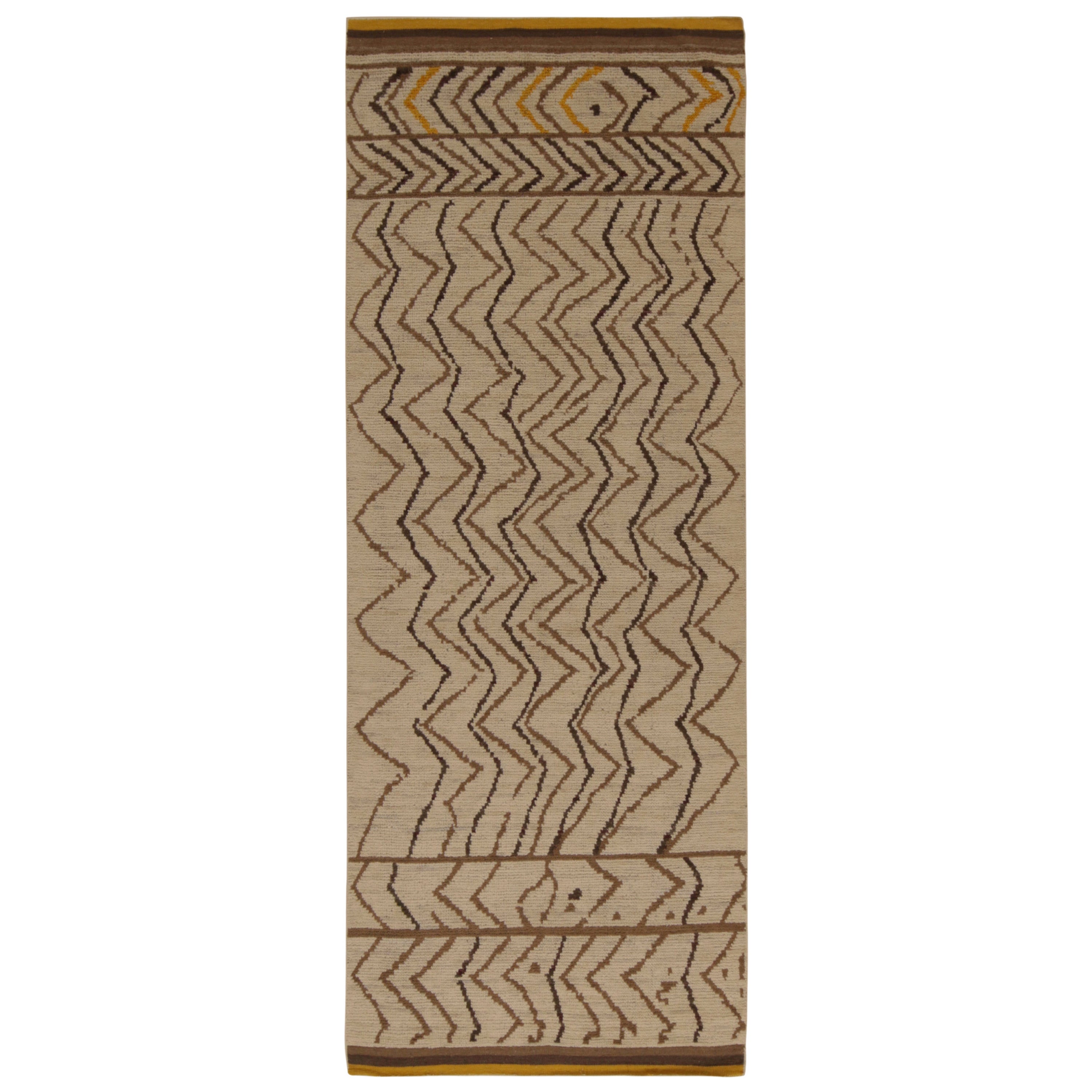 Rug & Kilim’s Moroccan Style Rug in Beige-Brown Chevrons with Gold Accents