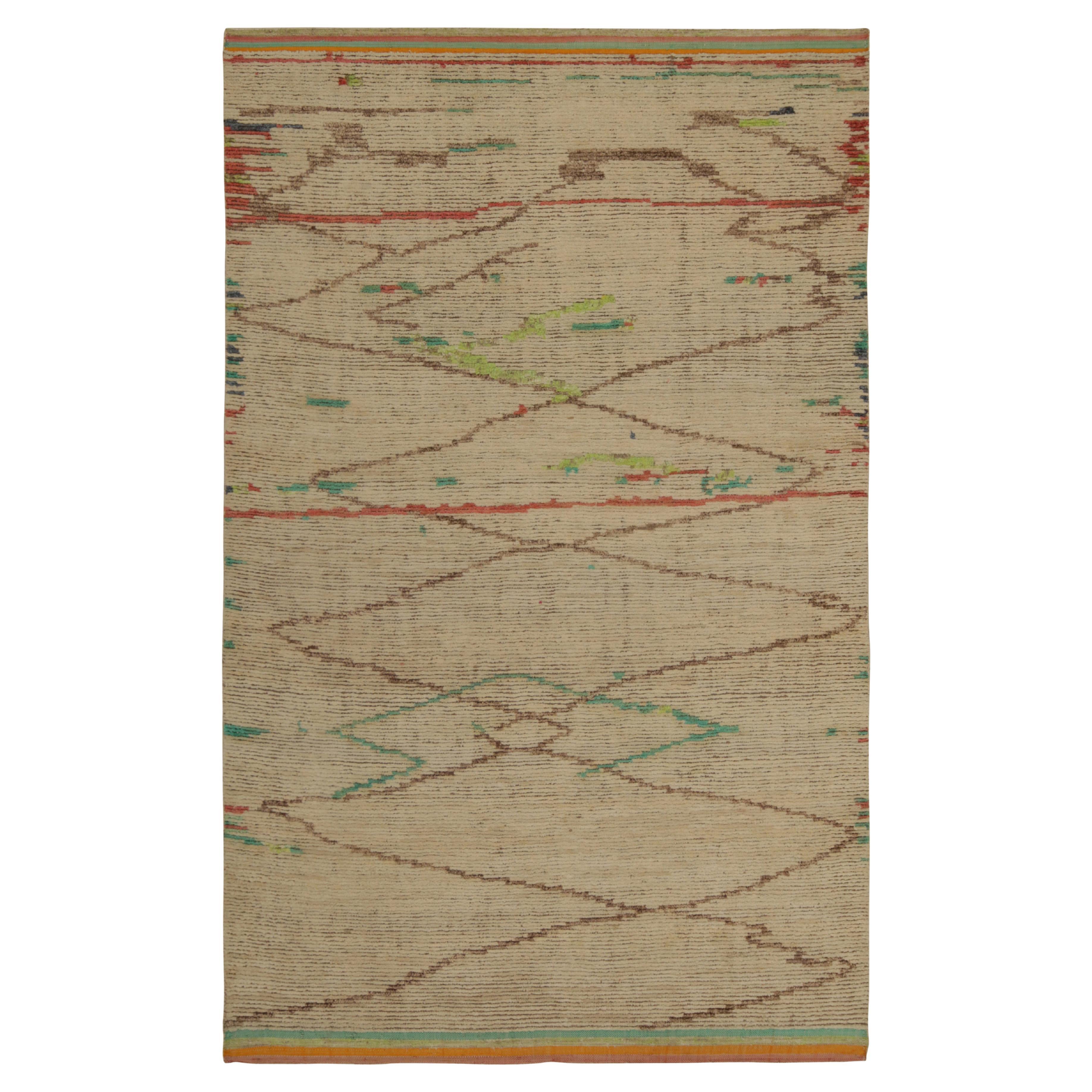 Rug and Kilim’s Moroccan style rug in BeigeBrown, Red and Green
