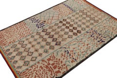 Rug & Kilim’s Moroccan Style Rug in Beige, Red and Blue Geometric Patterns