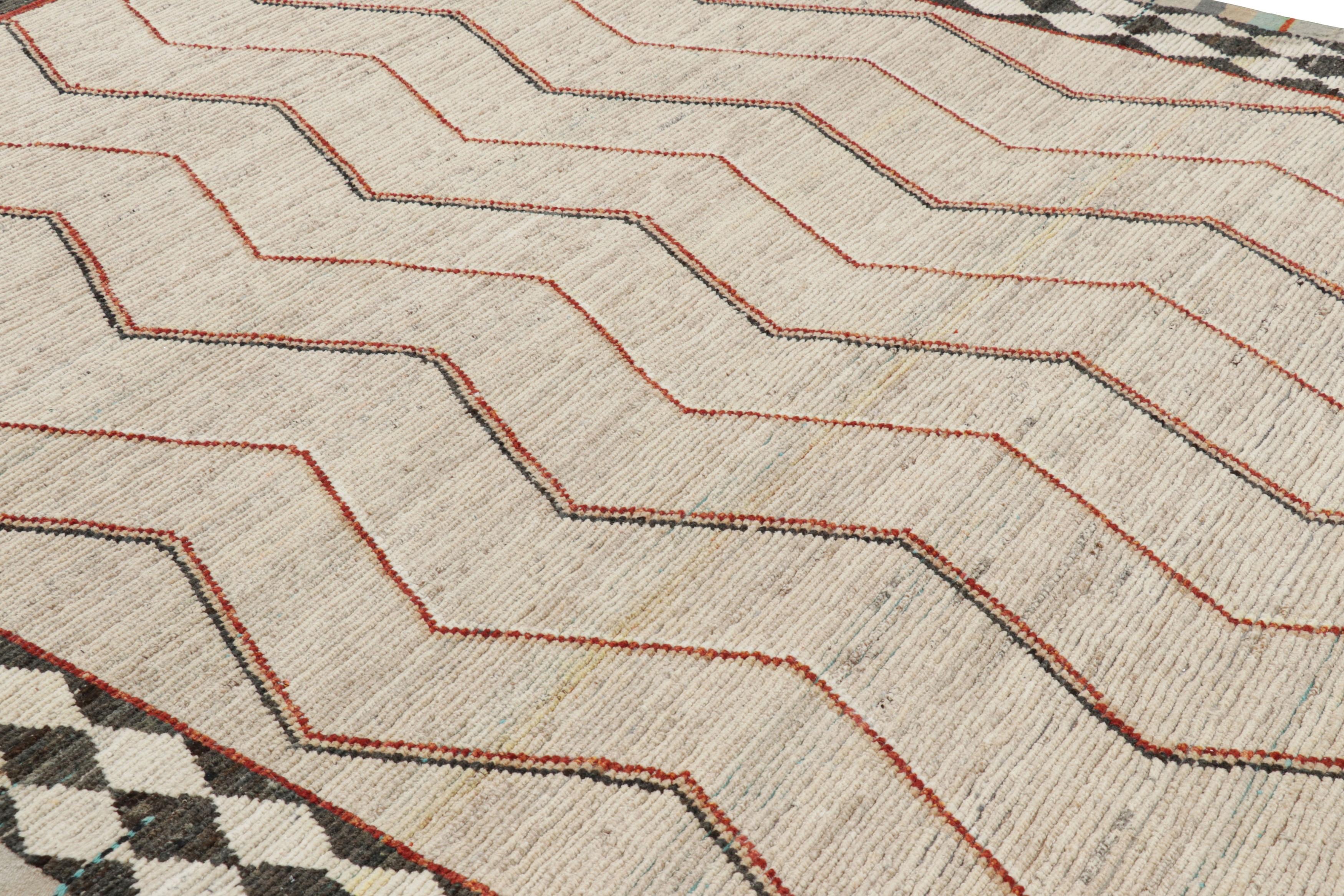 Tejida a mano en lana, esta alfombra contemporánea de 8x10 de Rug & Kilim es una emocionante y moderna reinvención de las alfombras marroquíes, y goza tanto de patrones como de técnicas de tejido inspiradas en las tradiciones tejedoras bereberes.