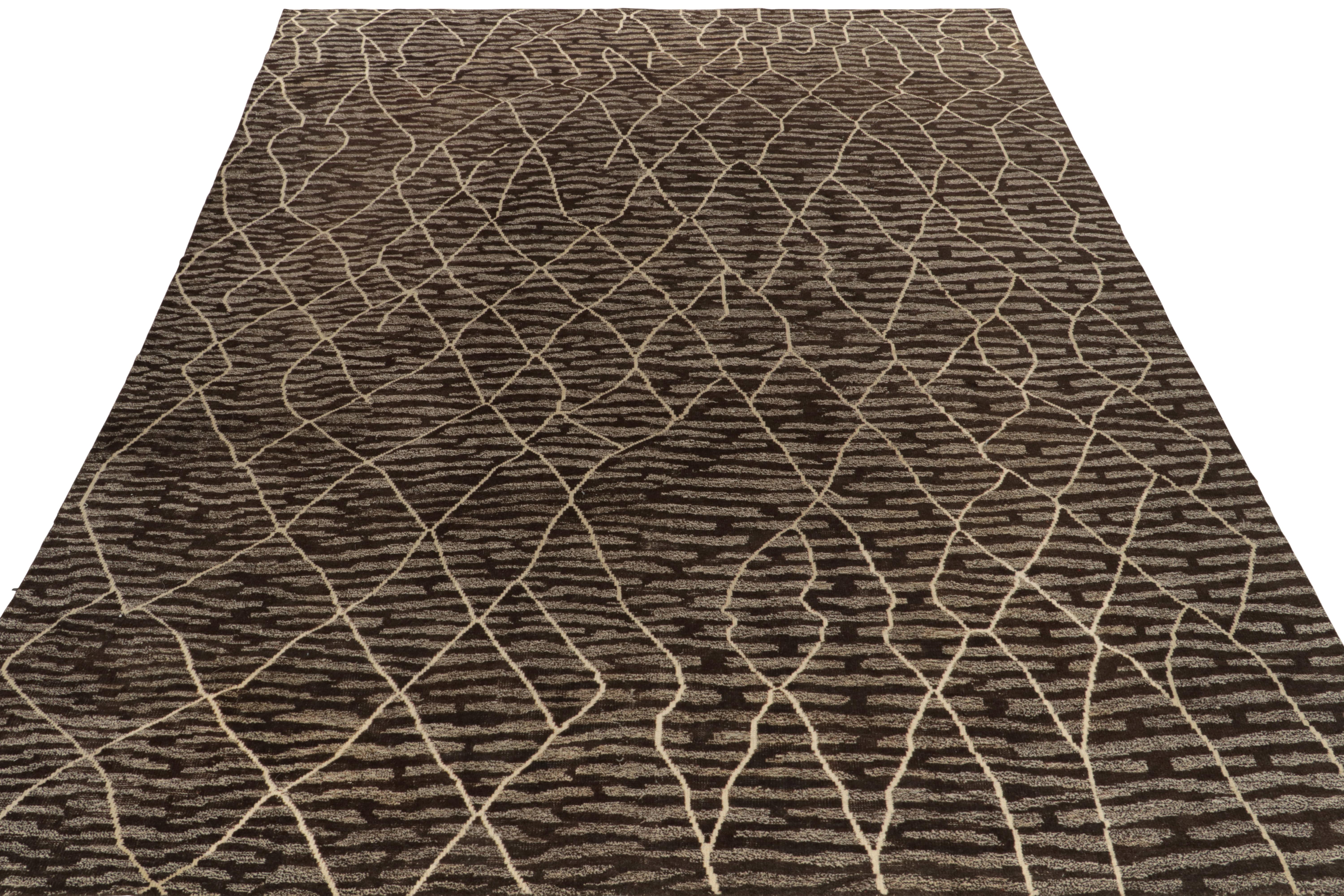 Rug & Kilim draws an intriguing modern tribute to Moroccan style with this 12x15 hand-knotted piece joining the titular collection. Relishing a subtle high-low tactility in wool, the rug carries a scintillating pattern in rich brown, black & off