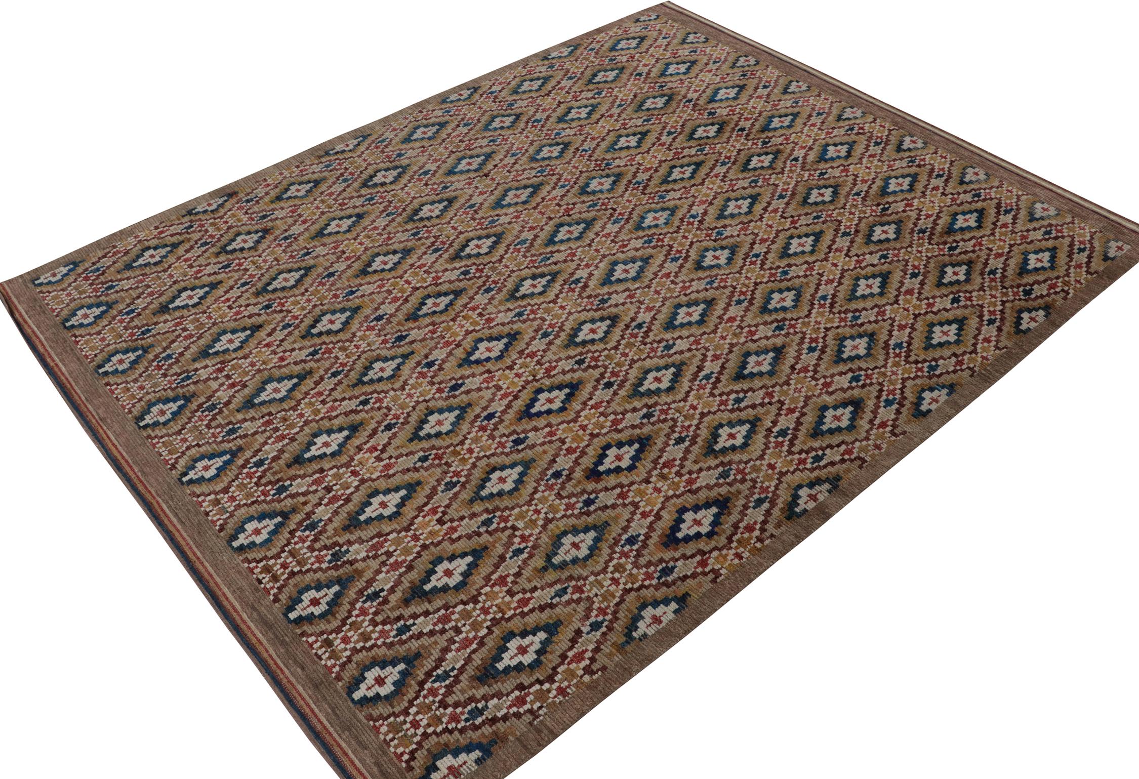 Rug & Kilim’s Moroccan style rug in Brown, Red and Blue Diamond Patterns
Description: This contemporary 9x12 rug is a grand entry in Rug & Kilim's new Moroccan Collection—a bold take on the iconic style. Hand-knotted in wool, silk, and