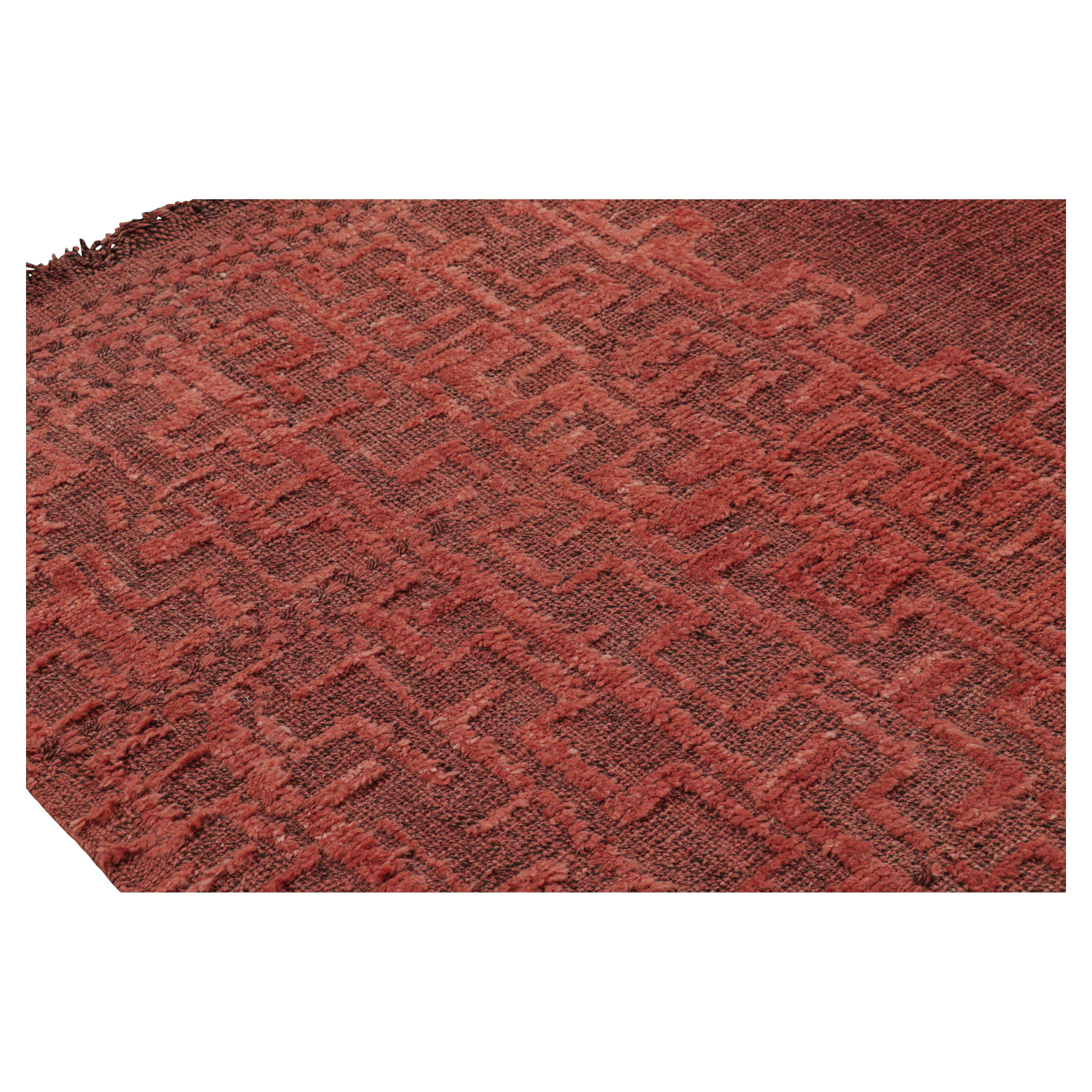 Made with hand-knotted wool and a high-low texture, this 9x14 modern Moroccan style rug in red features a design with a contemporary approach unlike any other to the Moroccan tribal style. 

On the Design: 

Connoisseurs may admire the hues of warm