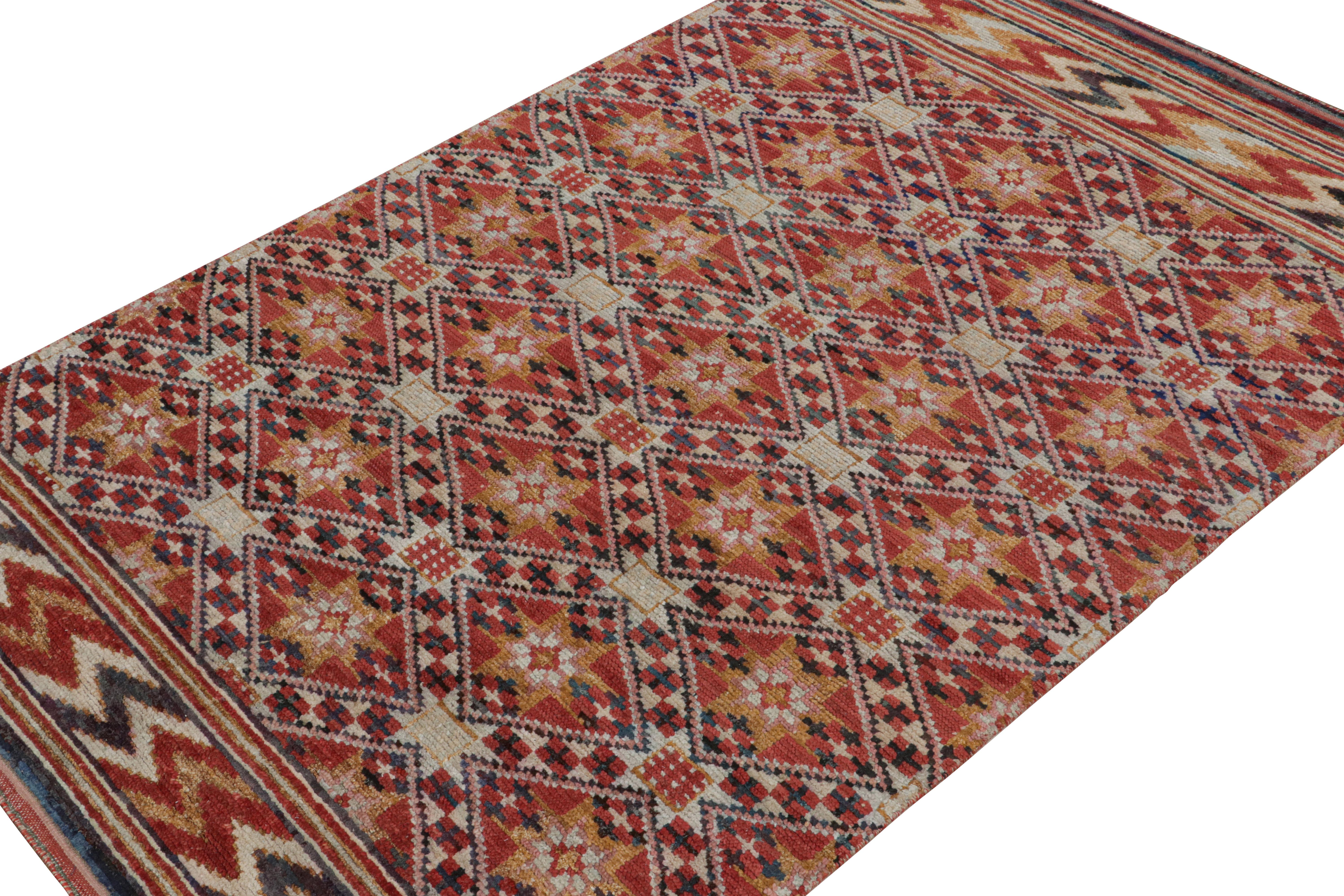 Hand-knotted in wool, silk & cotton, this 6x10 rug is a new addition to the Moroccan rug collection by Rug & Kilim. 

On the Design:

This rug is a contemporary take on the primitivist Berber style, with gold geometric patterns on a red field. Keen