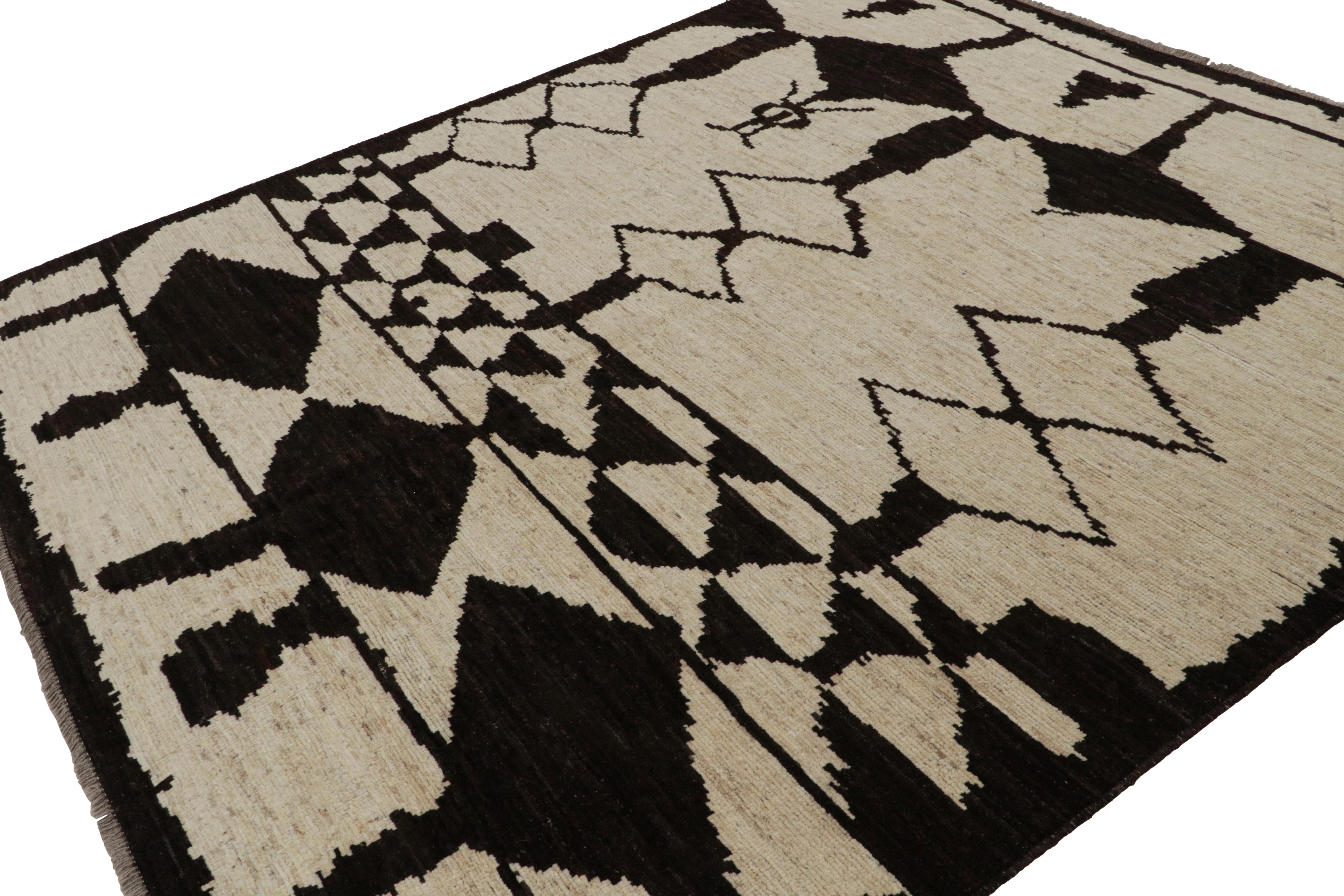 This hand-knotted wool 9x10 Moroccan rug is an exciting addition to the Moroccan rug collection by Rug & Kilim. Its design features geometric patterns in the primitivist Berber style. 

On the Design: 

Admirers of the craft may appreciate that this