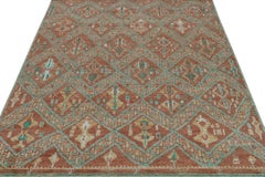 Rug & Kilim’s Moroccan Style Rug in Rust Red & Green Geometric Pattern