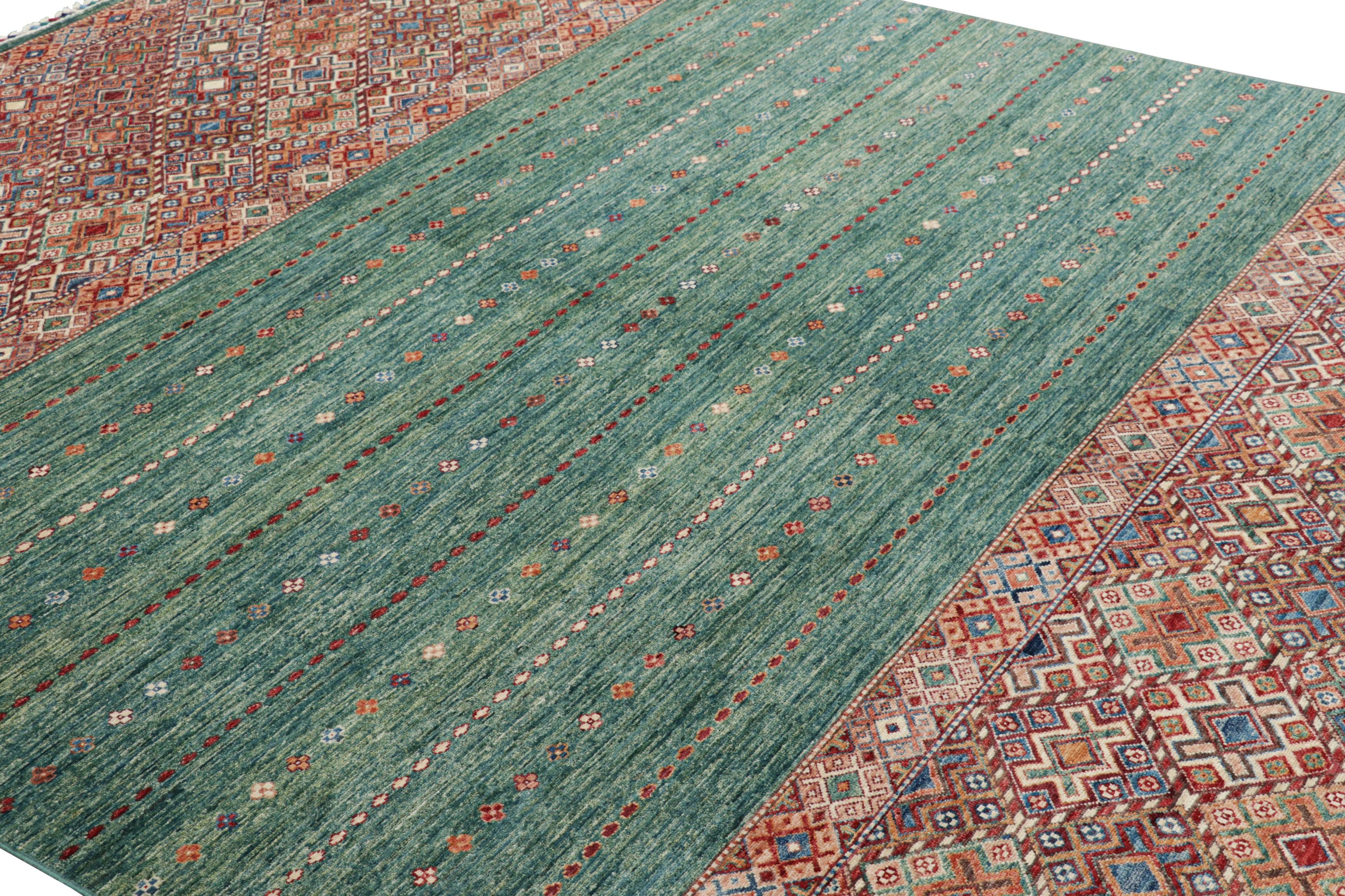 Hand-knotted in wool, this 8x11 rug is one of the most bold and exciting new additions to Rug & Kilim’s Moroccan and Modern Classics Collection, with a most unexpected and arresting look at tribal rugs and nomadic sensibilities. 

On the