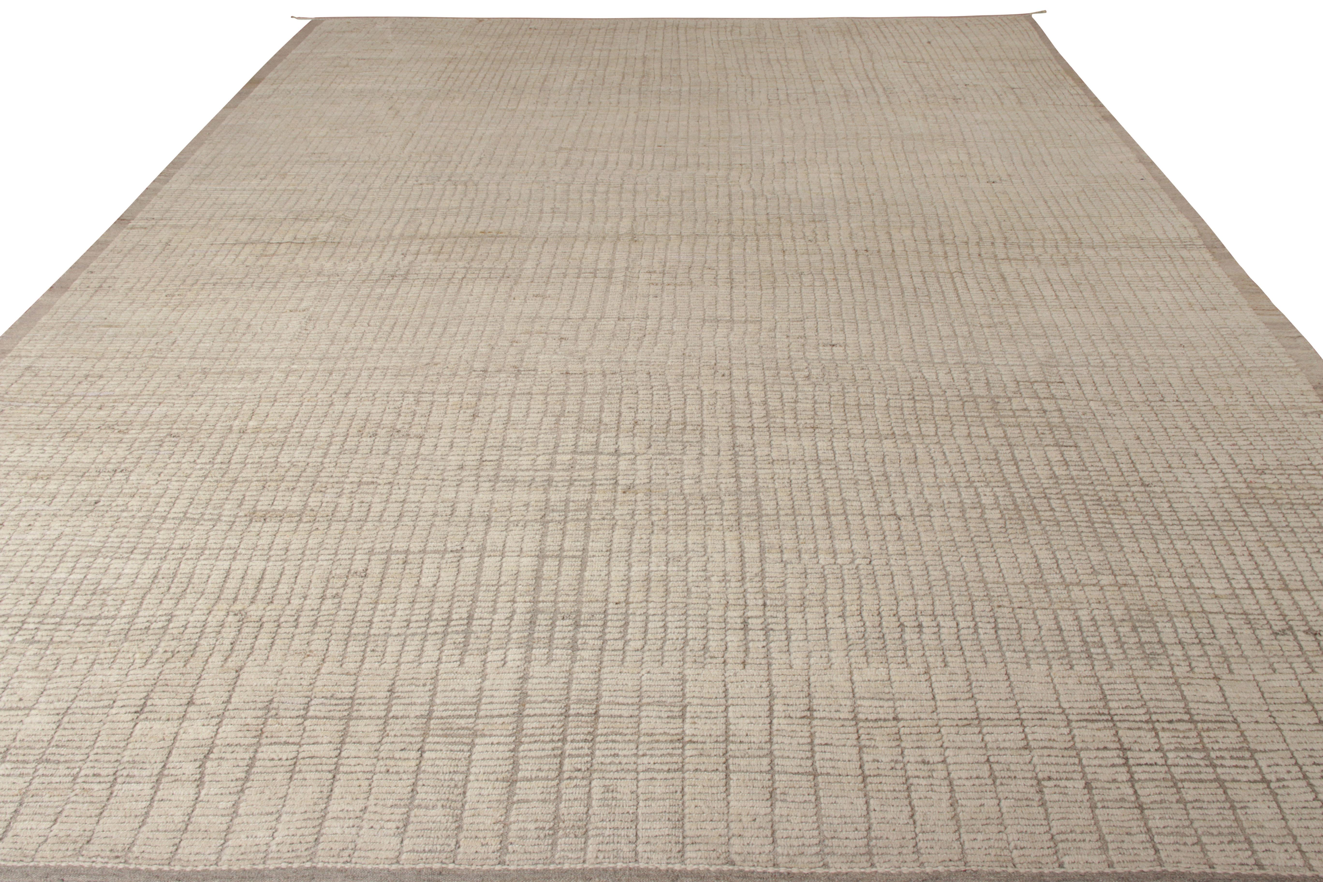 One of Rug & Kilim’s Moroccan style masterpieces, this 13x16 handmade portrait marries a unique gradiance of high-low texture with a comforting white and beige-brown colorway for a whole new kind of neutral and seamless symmetry across the scale. A