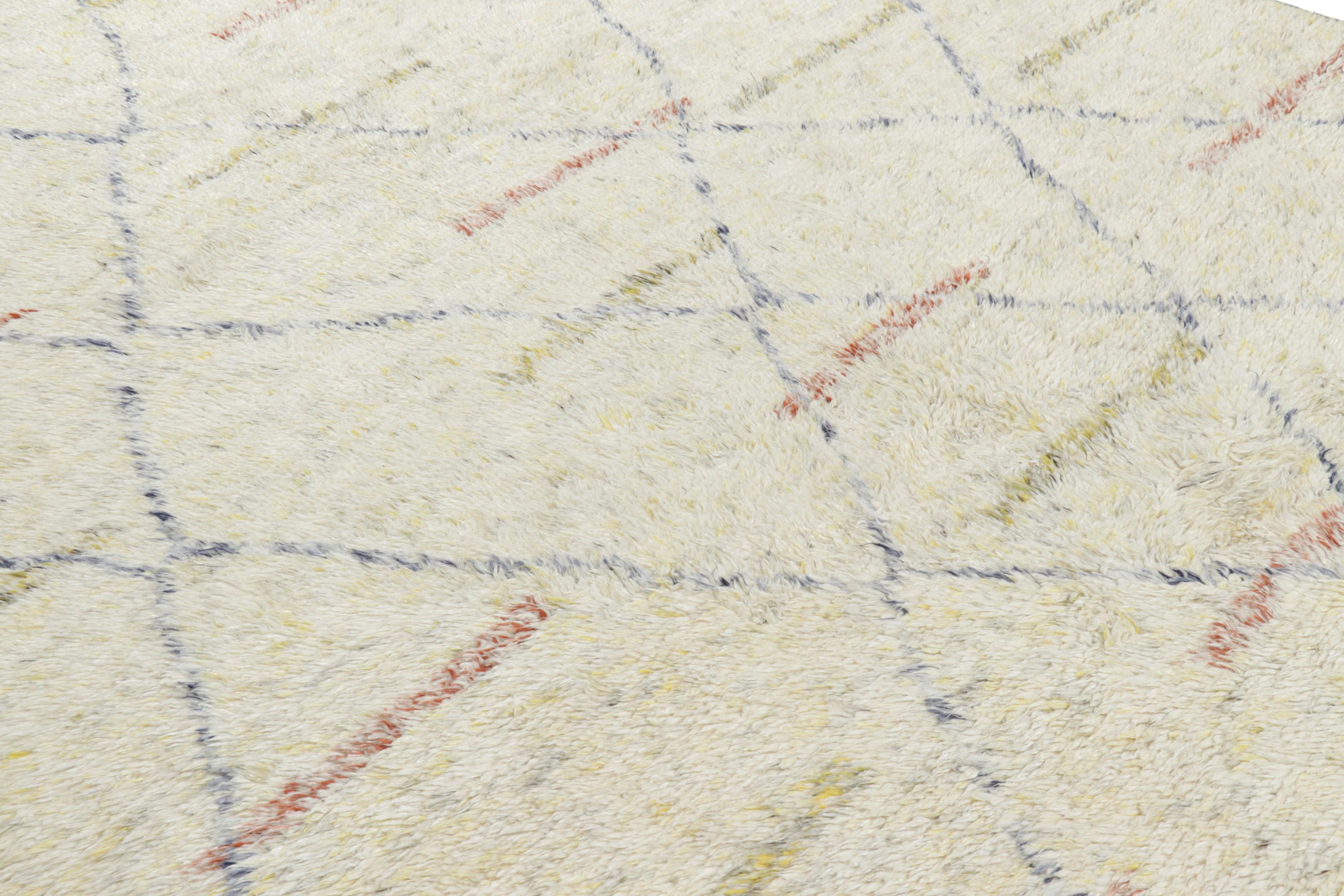 Hand-knotted in wool, this 8x10 contemporary rug by Rug & Kilim is an exciting, modern reimagining of Moroccan rugs, and enjoys both patterns and weaving techniques inspired by the primitivist Berber weaving traditions.

On the Design: 

This