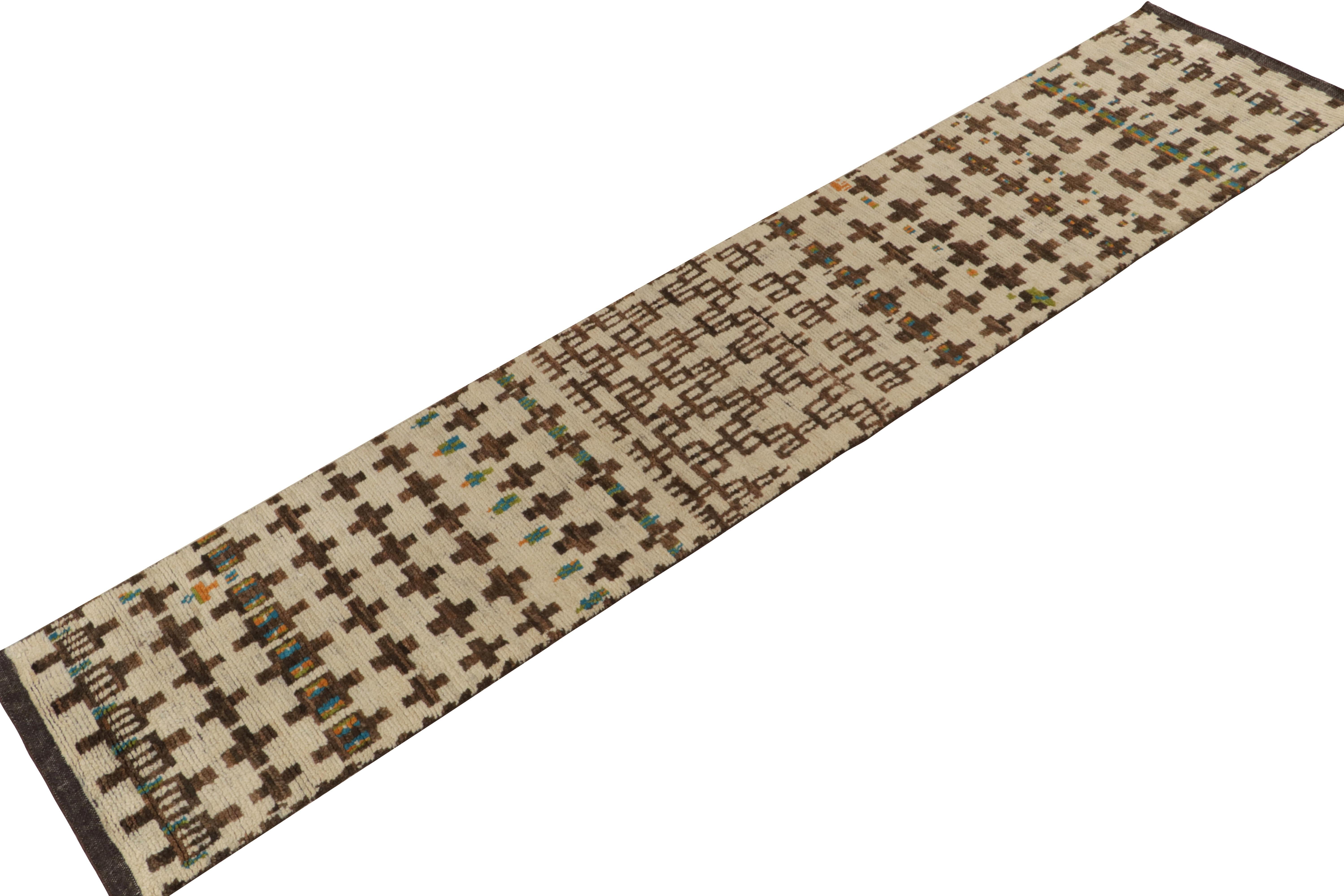 Hand-knotted in wool and silk, a 3x12 runner from Rug & Kilim’s contemporary odes to Moroccan tribal style. 

On the design: This piece enjoys an exceptional movement with cross motifs and geometric patterns in robust chocolate brown atop beige.