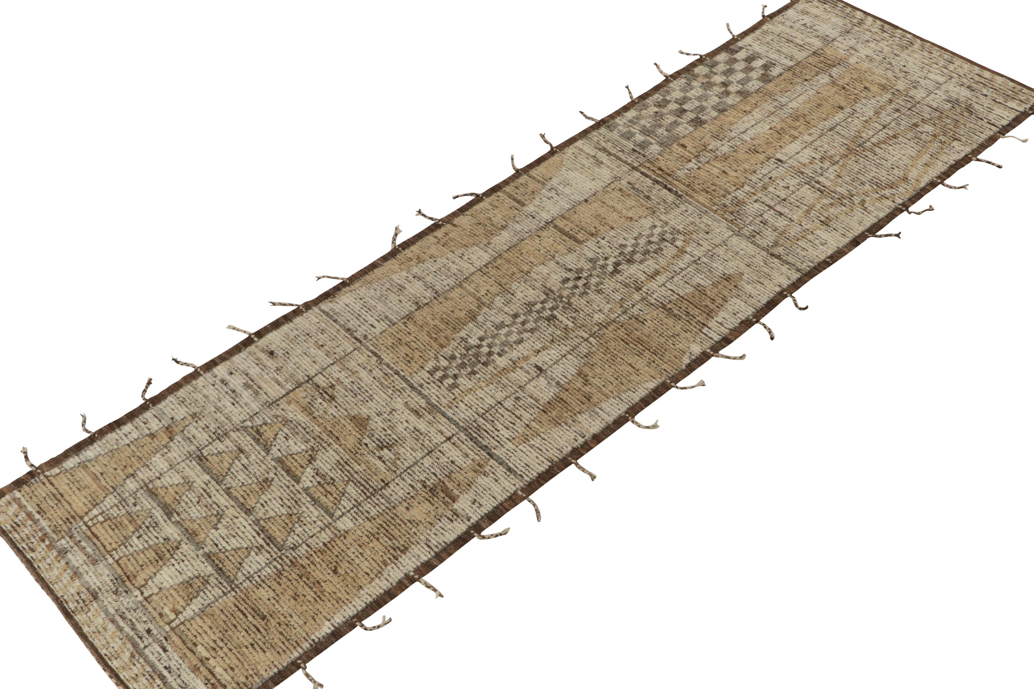 Rug & Kilim presents an alluring take on Moroccan style with this 3x10 hand-knotted wool piece, joining the titular collection. The runner enjoys a contemporary rendition of geometry in a muted colorway of white, gold & beige-brown exemplifying the