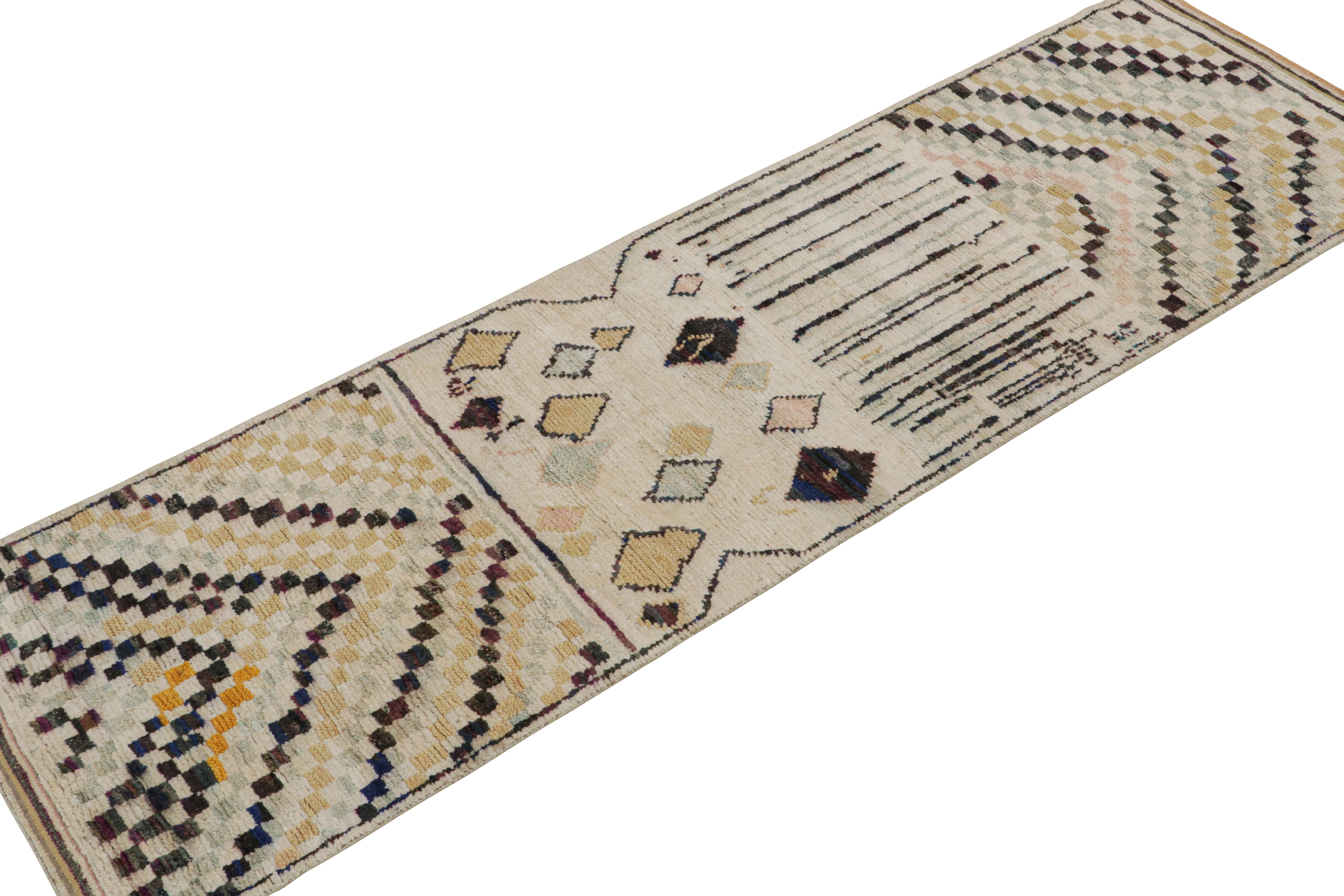 Hand-knotted in wool, silk and cotton, this 3x10 runner rug is a new addition to the Moroccan rug collection by Rug & Kilim. 

On the Design

This designs represent a modern take on the Berber primitivist style, with multicolor geometric patterns on