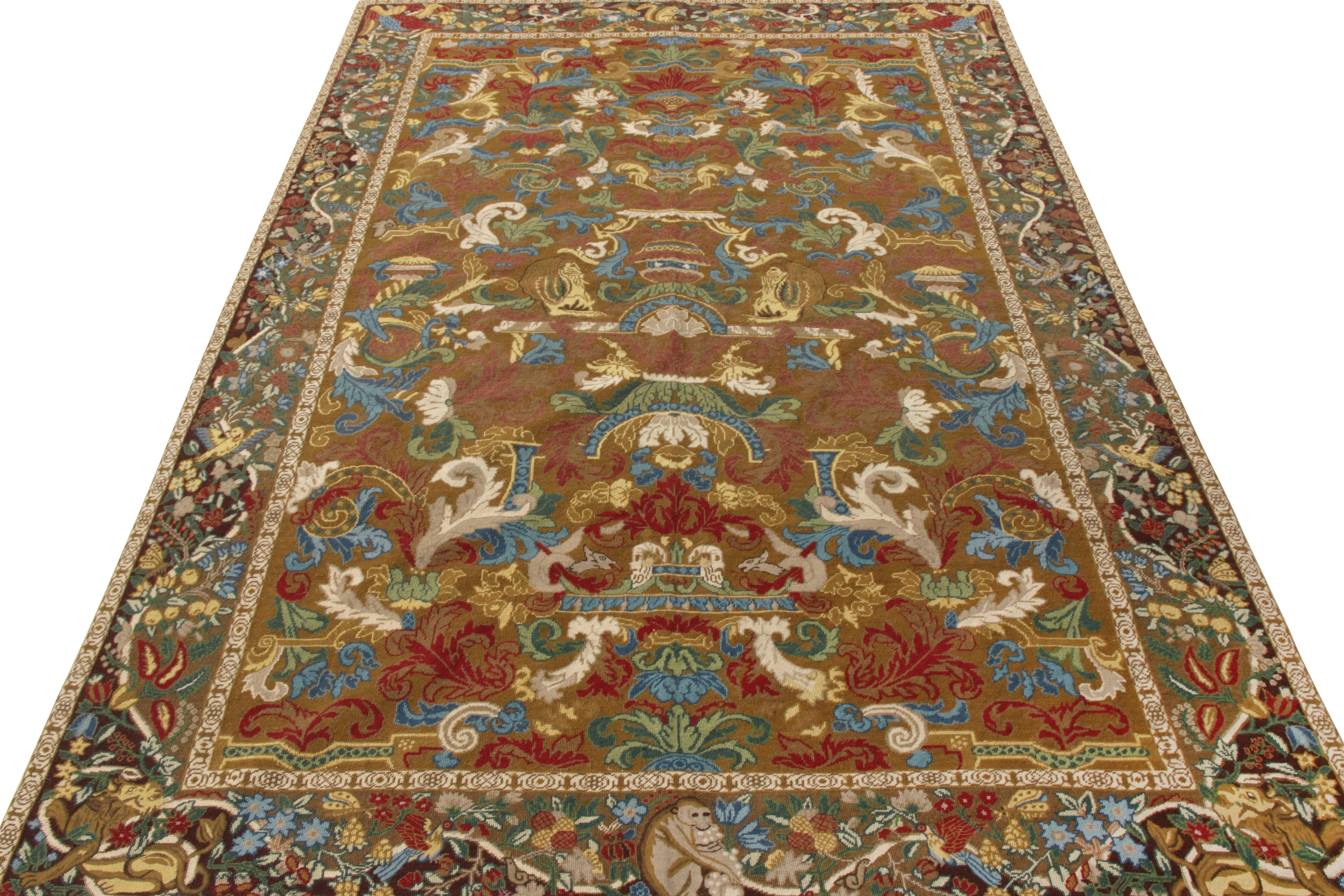 Une majestueuse pièce à l'aiguille 6x9 qui vient s'ajouter à la Collection Modern Classics de Rug & Kilim. Le tapis présente des représentations picturales d'animaux au centre, entourées d'un motif floral dense dans un spectre de couleurs riches