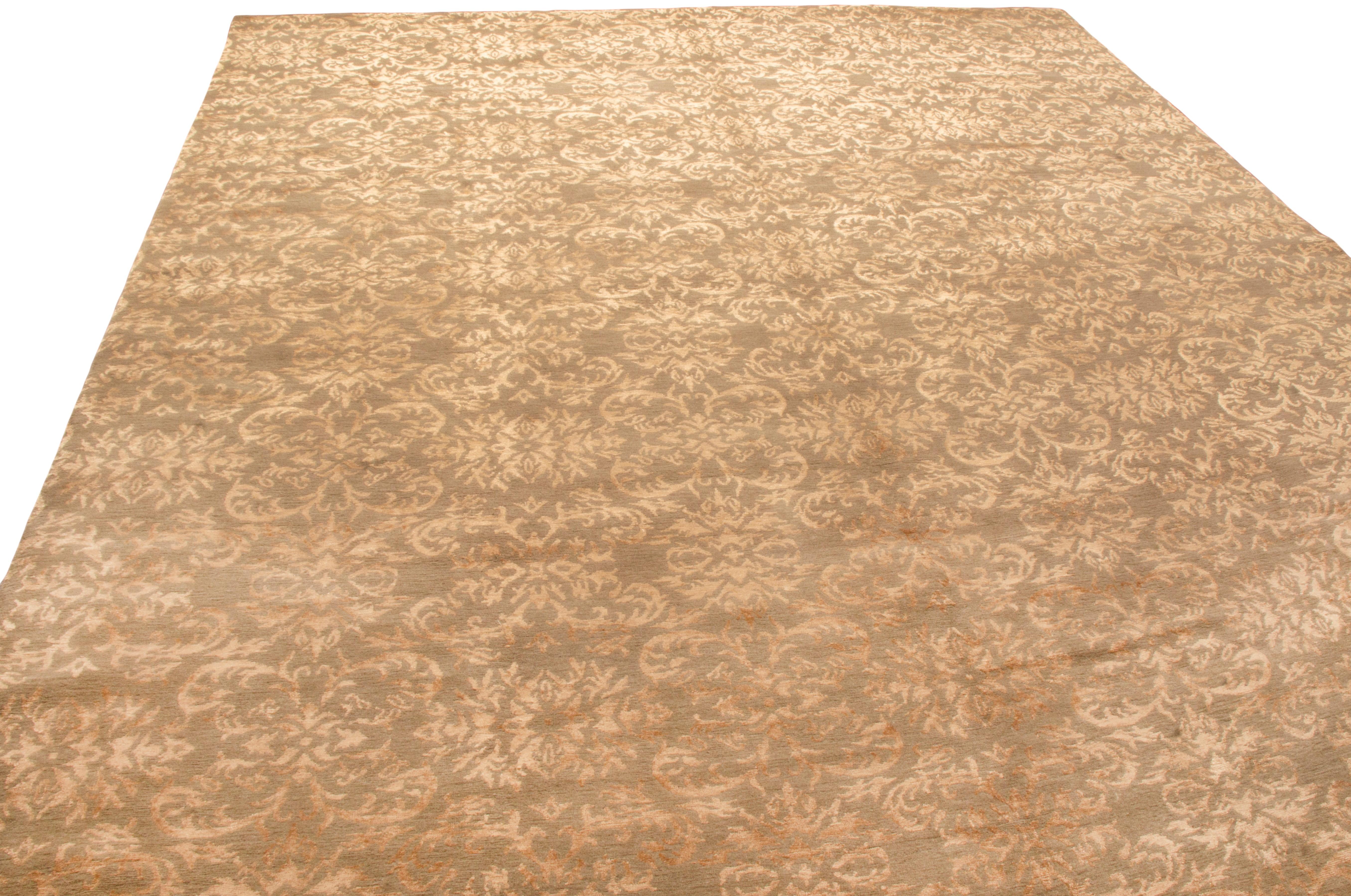Originating from Nepal, this new Arabesque rug features a lustrous, fine weave of wool and silk complementing the all over field design. Hand knotted, the dominant, brass gold colourway is emphasized through the silk’s natural luster, giving a regal