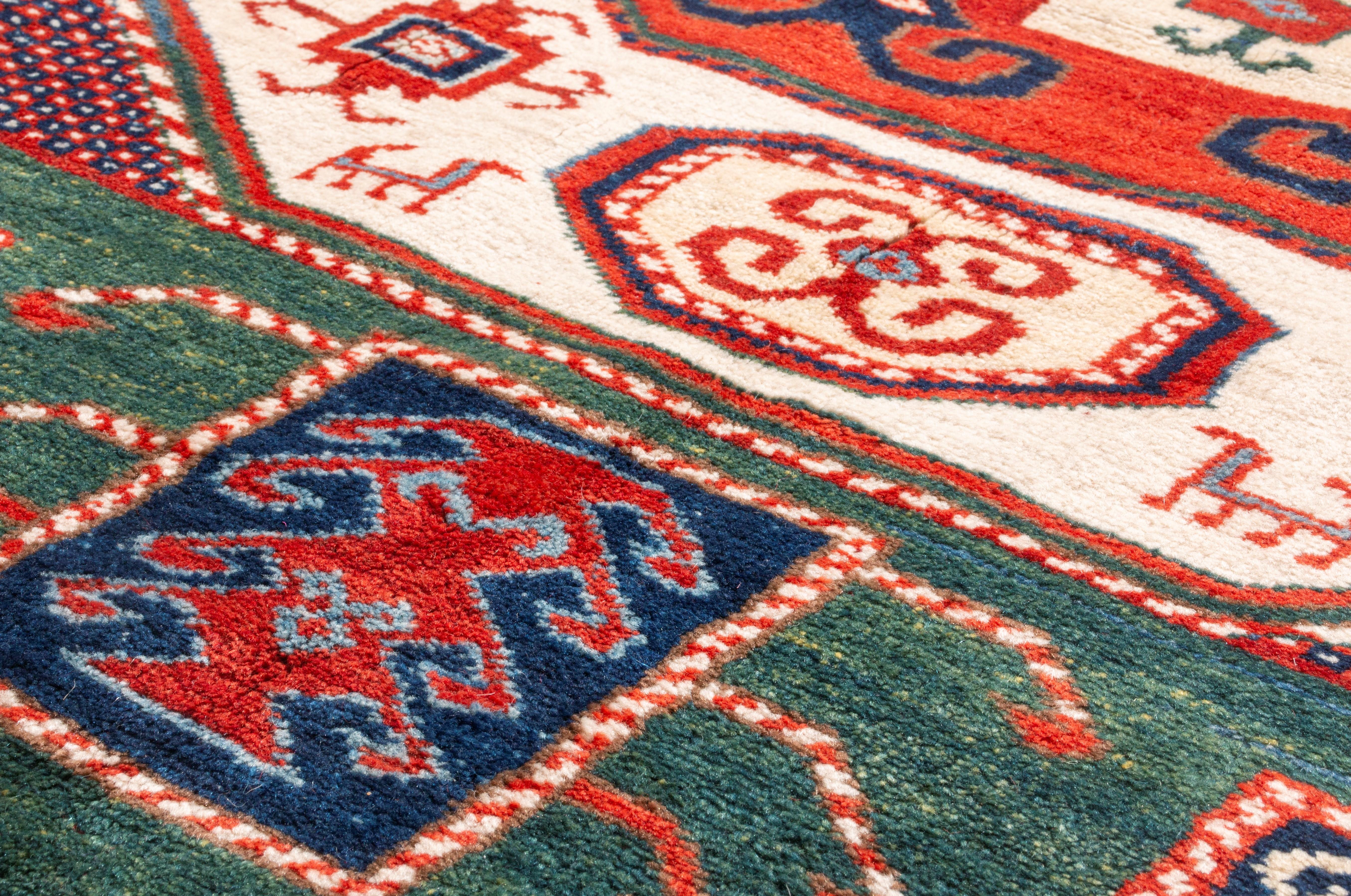 Hand-Knotted Rug & Kilim's New Kazak Transitional Red and Green Wool Rug with Horn Motifs For Sale
