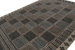 Rug & Kilim’s “Nu” Scandinavian Style Rug in Blue with Geometric Patterns