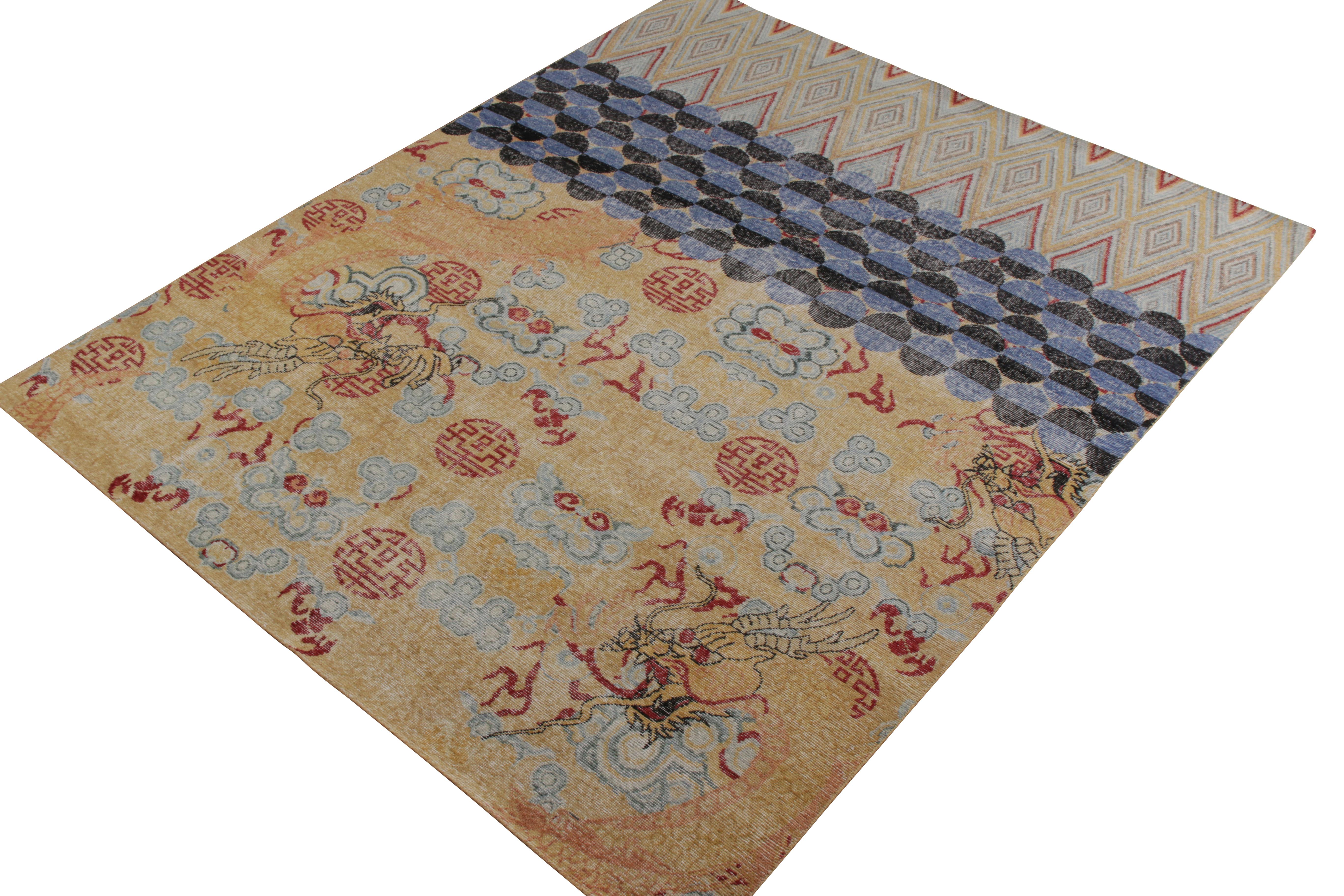 An 8x10 transitional rug in gold and blue from the Homage Collection by Rug & Kilim. Affectionately dubbed 