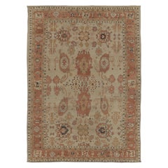 Rug & Kilim’s Oushak Inspired Rug in Creamy Beige with Rust Floral Patterns