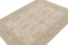 Rug & Kilim’s Oushak Rug in Beige, Gold and Blue Floral Patterns