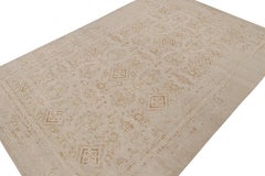 Rug & Kilim’s Oushak Style Oversized Rug in Taupe with Rust Floral Patterns
