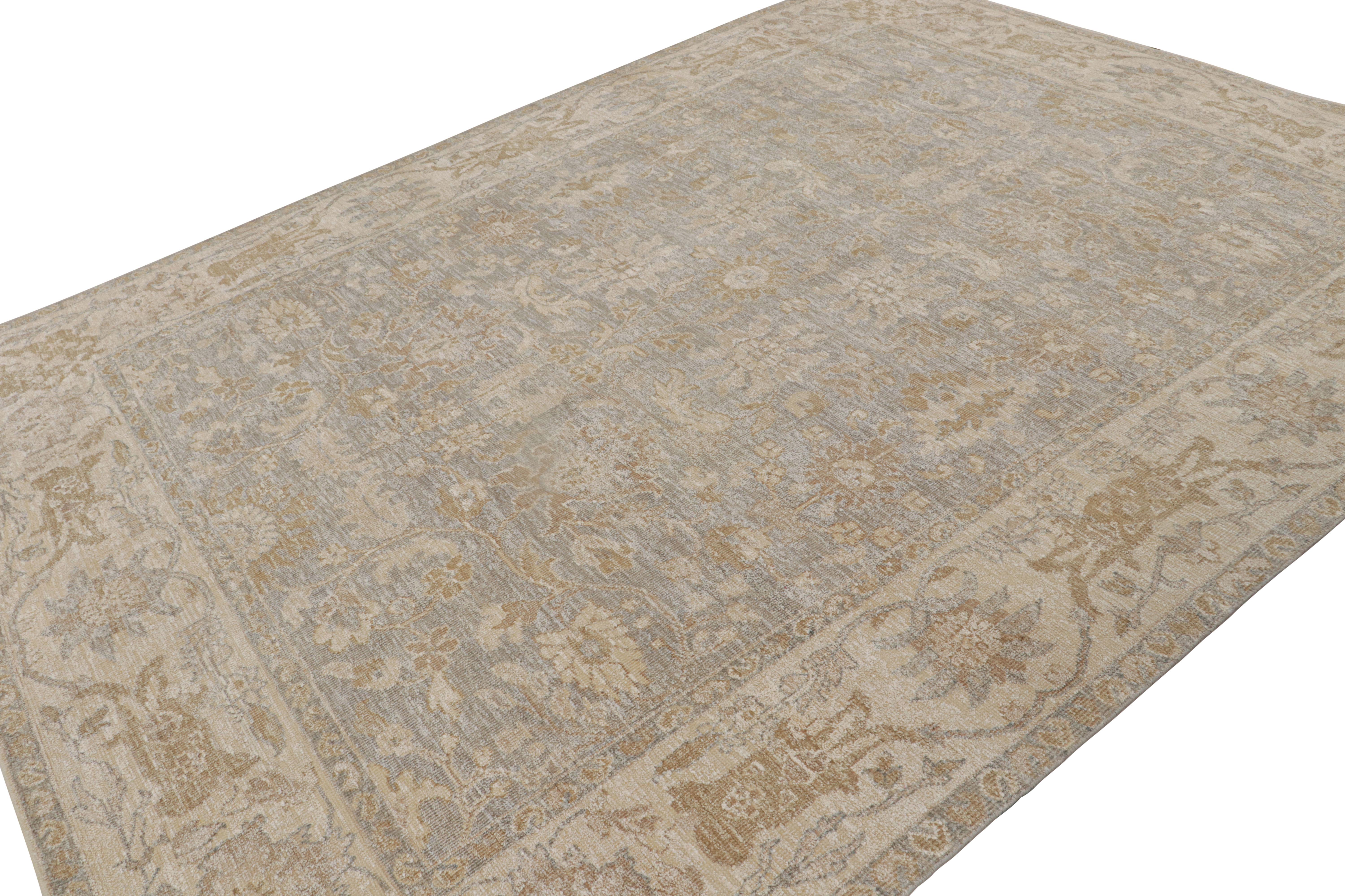 This 9x12 rug from the Modern Classics Collection features beige/brown and silver/gray underscores, ivory floral patterns in a rich and elegant look.  

On the design: 

Connoisseurs will admire that this rug is made with a new yarn Josh Nazmiyal is