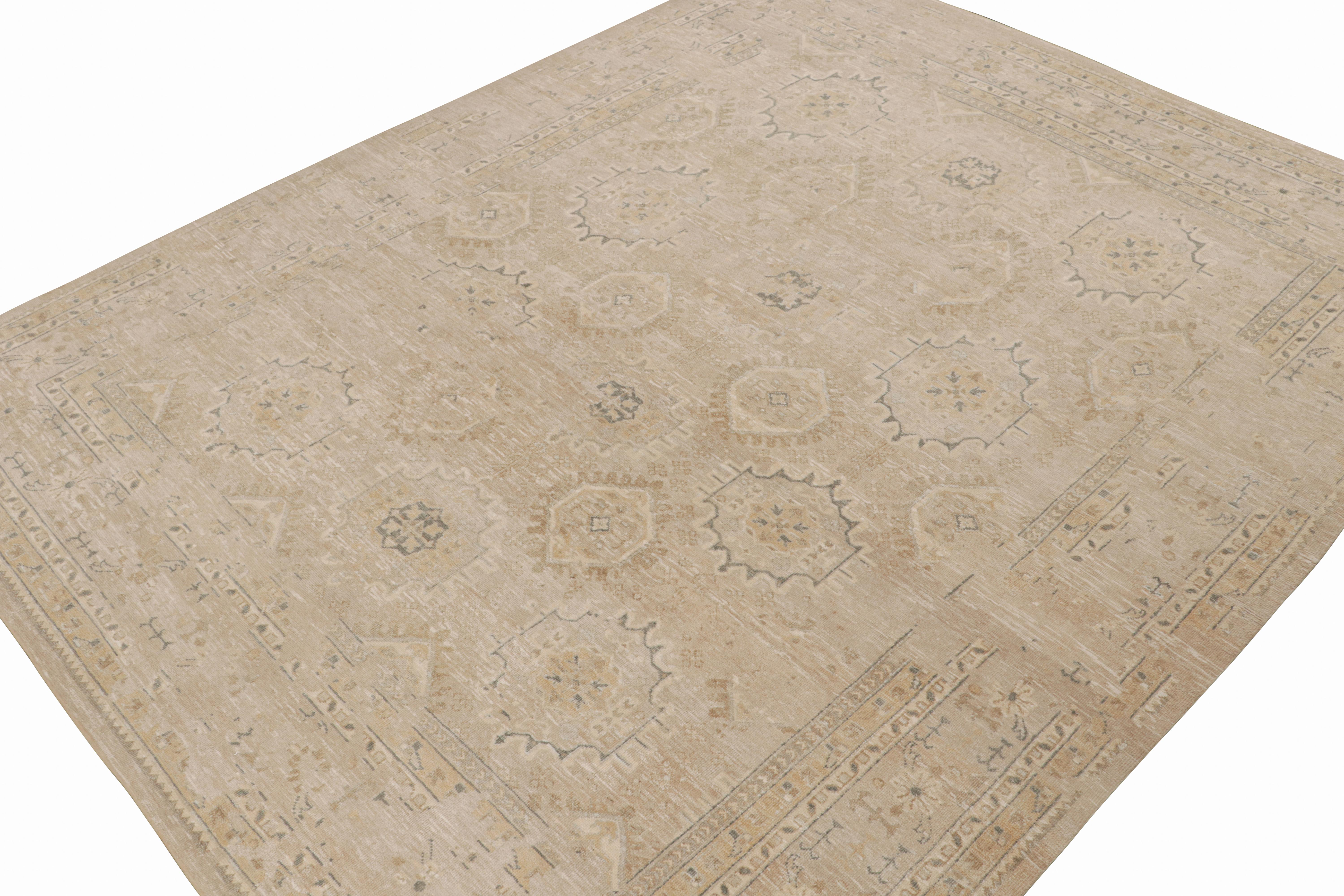 This 12x15 rug is inspired by antique Oushak rugs—from a bold new Modern Classics Collection by Rug & Kilim. Hand-knotted in silk, it enjoys beige-brown and ivory undertones, teal and gold accents, tribal motifs and floral patterns. 

On the
