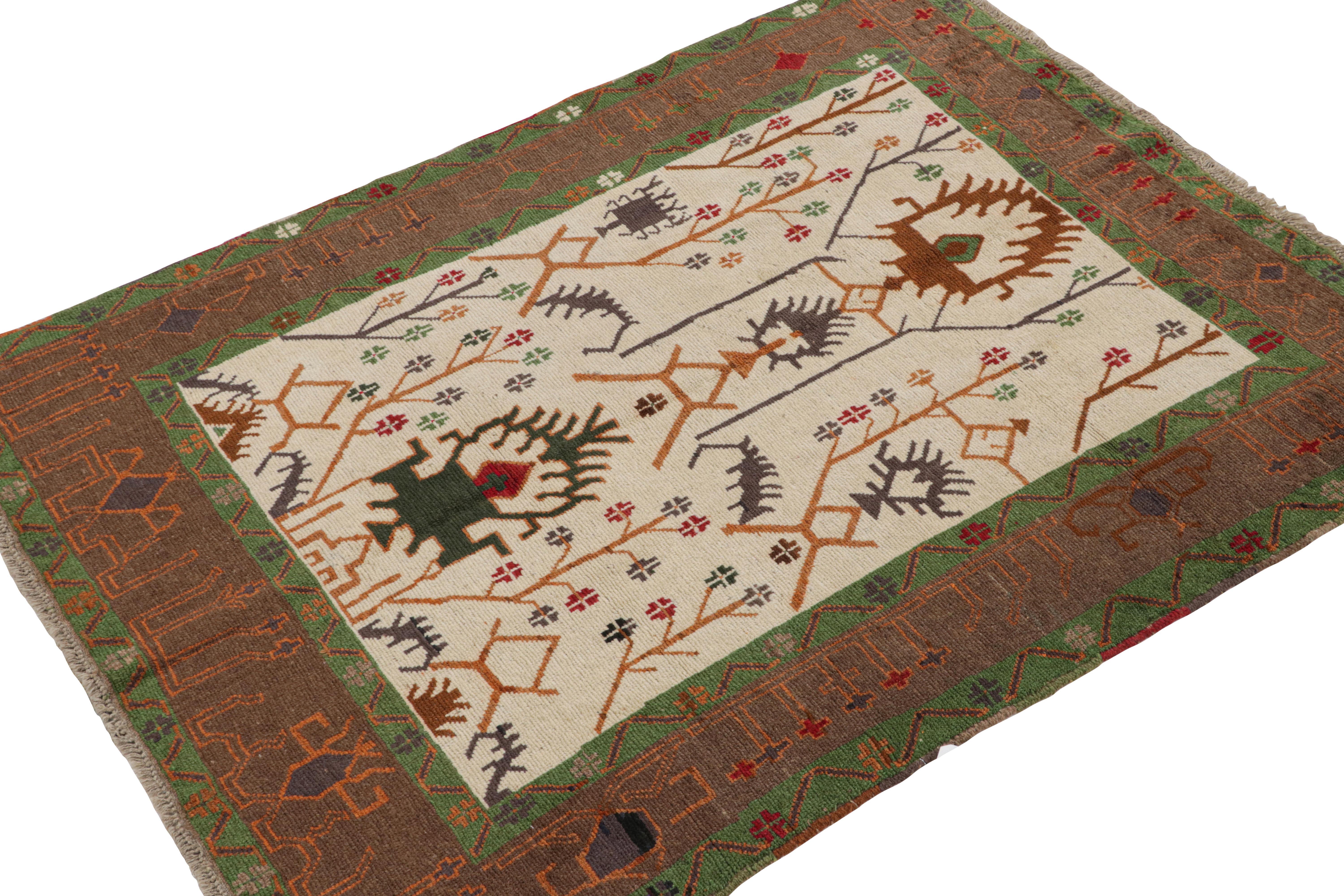 Inspired by Oushak tribal rugs, this 5x6 rug is the latest to join Rug & Kilim’s Modern Classics collection. 

Hand-knotted in wool, its design represents a playful take on this style—particularly the more vibrant green and orange tones in the