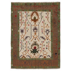Rug & Kilim's Oushak-Teppich in Beige mit grünen und rostfarbenen geometrischen Mustern