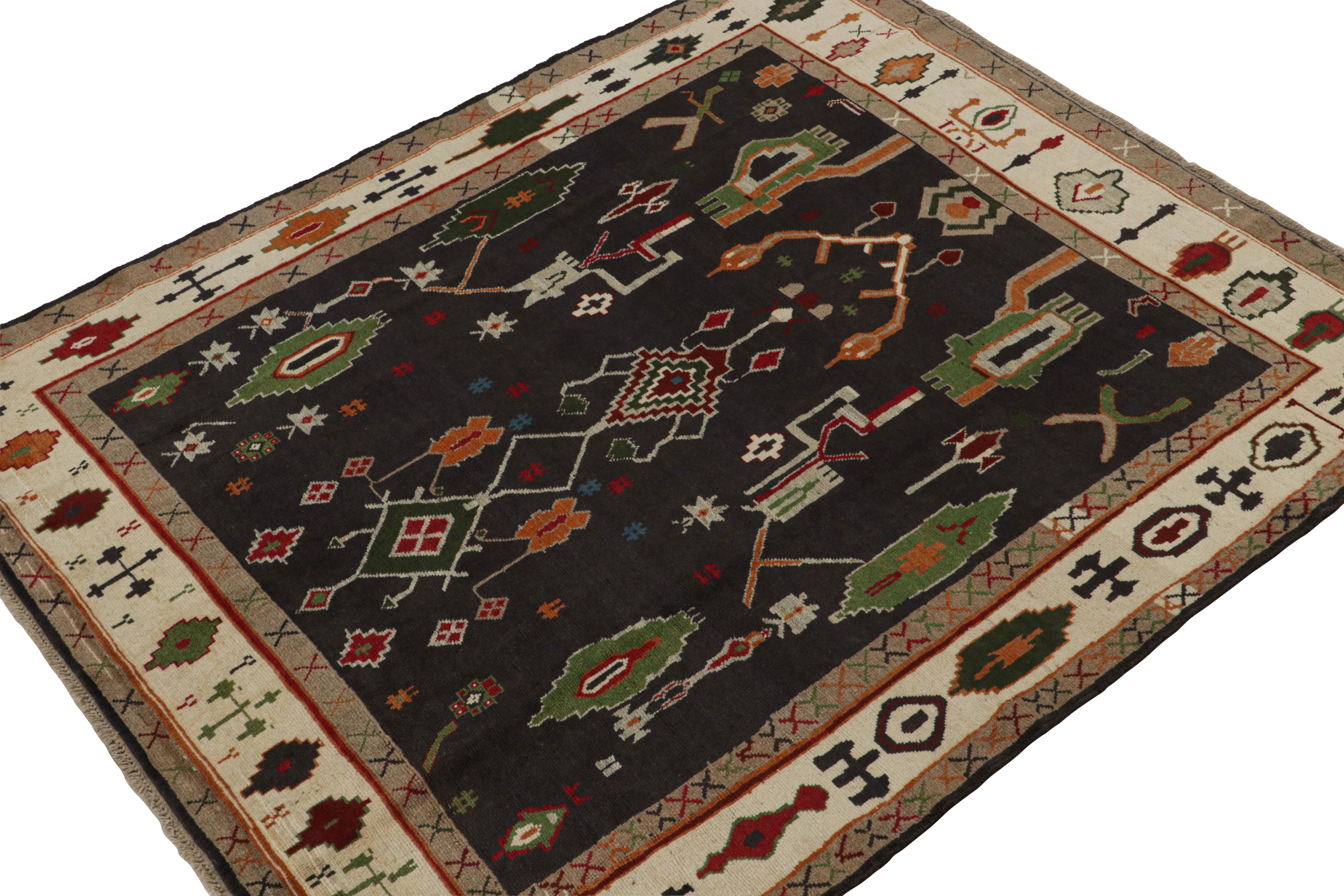 Hand-knotted in wool, this 7x9 rug is from the Modern Classics Collection by Rug & Kilim—inspired by antique Oushak rugs. 

On the Design:

This piece enjoys a bold approach to this style that plays more vibrant geometric patterns on a black