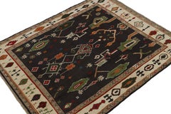 Rug & Kilim’s Oushak Style rug in Black with Colorful Geometric Patterns